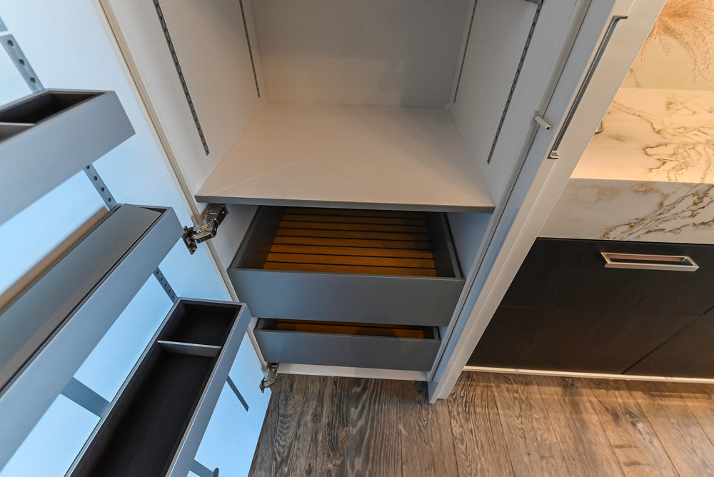 SieMatic S2 Modern Rose Gold Handleless Island with Lotus White Hideaway Pantry