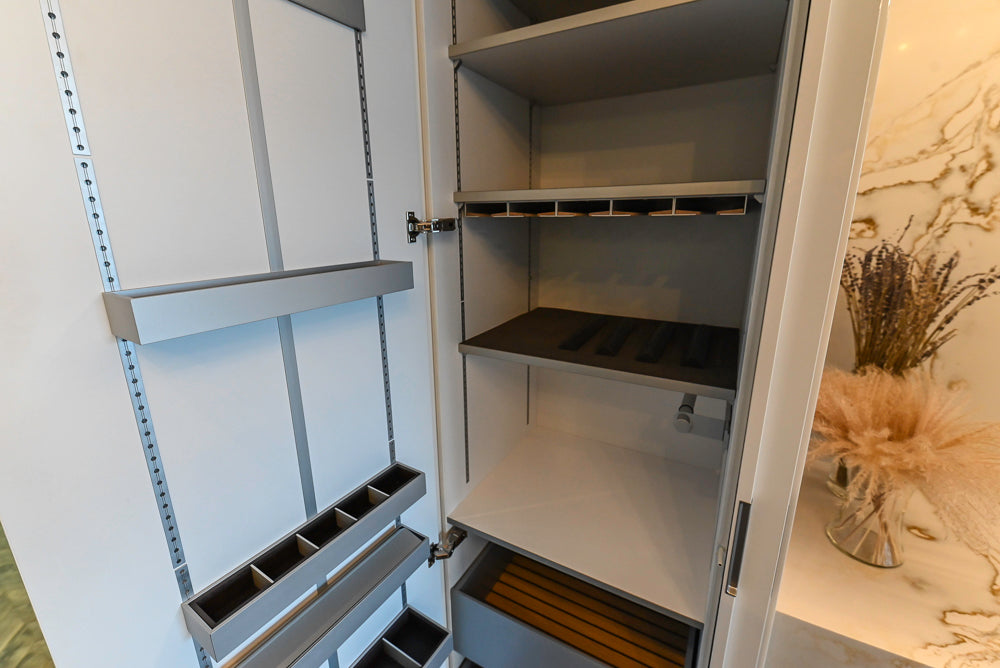 SieMatic S2 Modern Rose Gold Handleless Island with Lotus White Hideaway Pantry