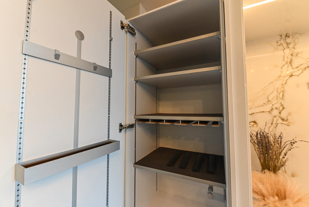 SieMatic S2 Modern Rose Gold Handleless Island with Lotus White Hideaway Pantry