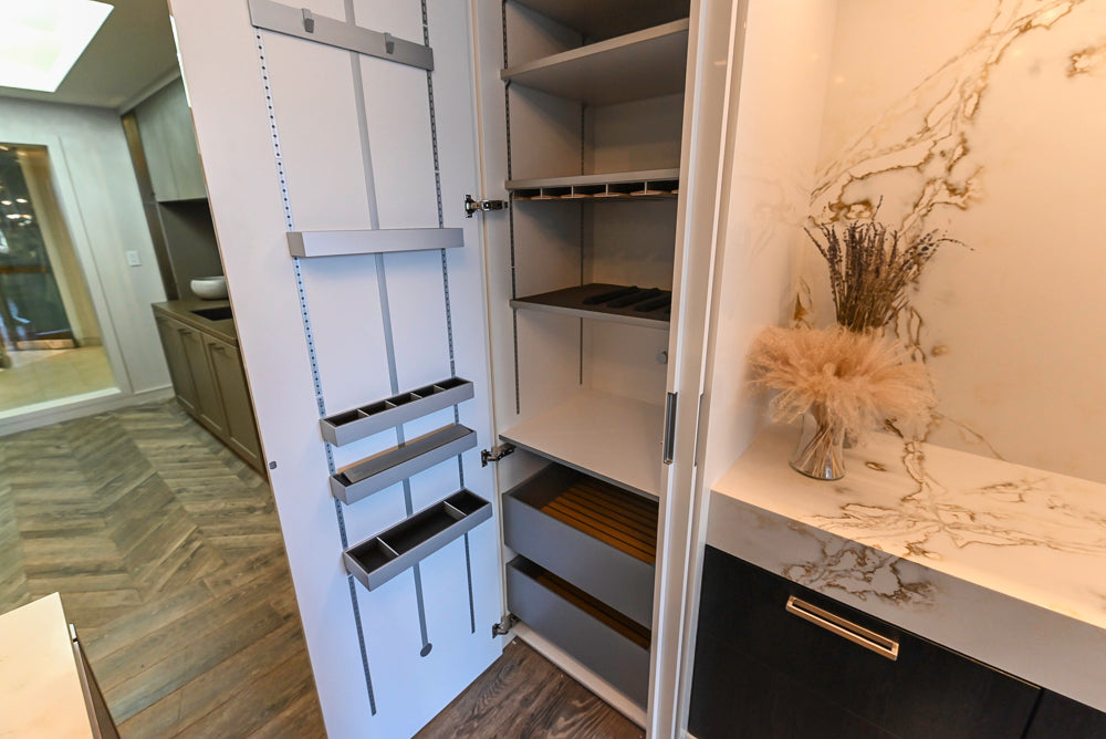 SieMatic S2 Modern Rose Gold Handleless Island with Lotus White Hideaway Pantry