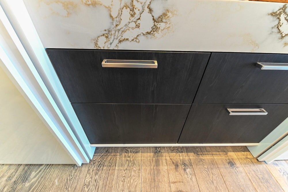 SieMatic S2 Modern Rose Gold Handleless Island with Lotus White Hideaway Pantry