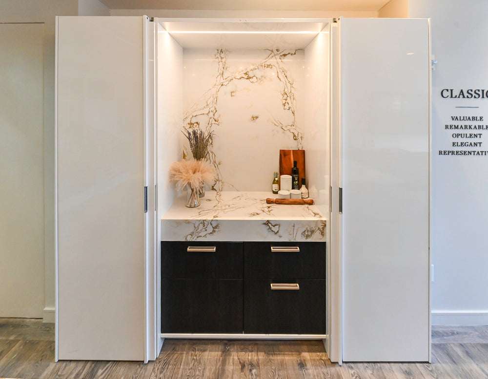 SieMatic S2 Modern Rose Gold Handleless Island with Lotus White Hideaway Pantry