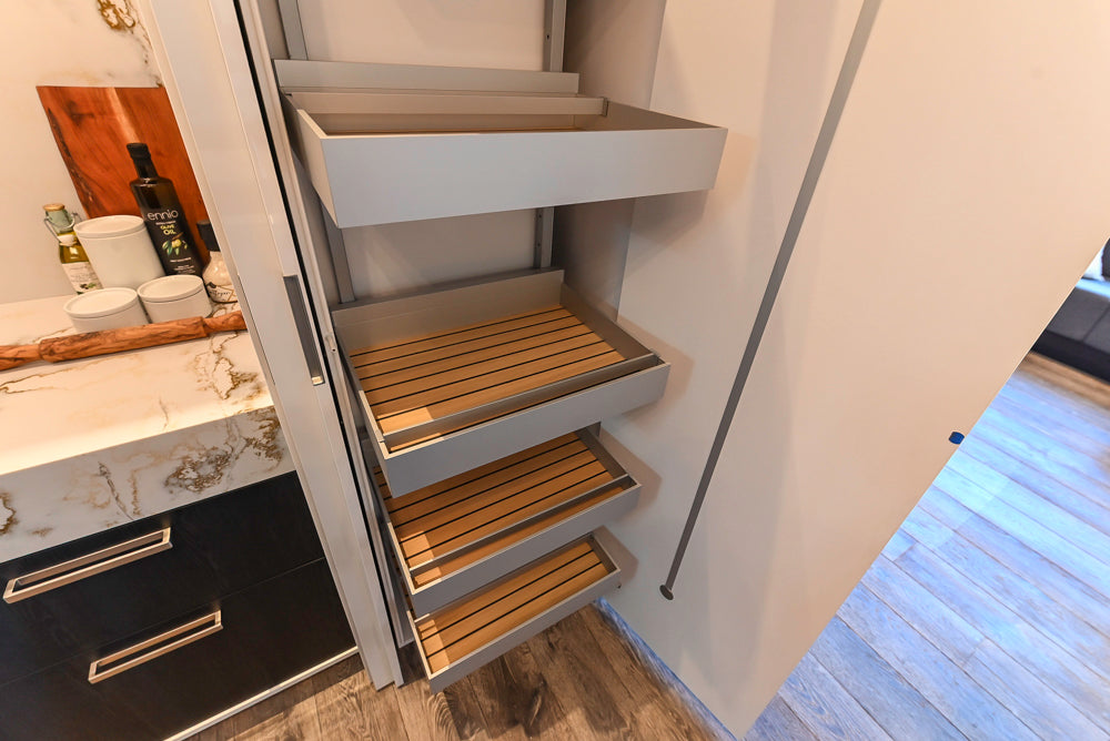 SieMatic S2 Modern Rose Gold Handleless Island with Lotus White Hideaway Pantry