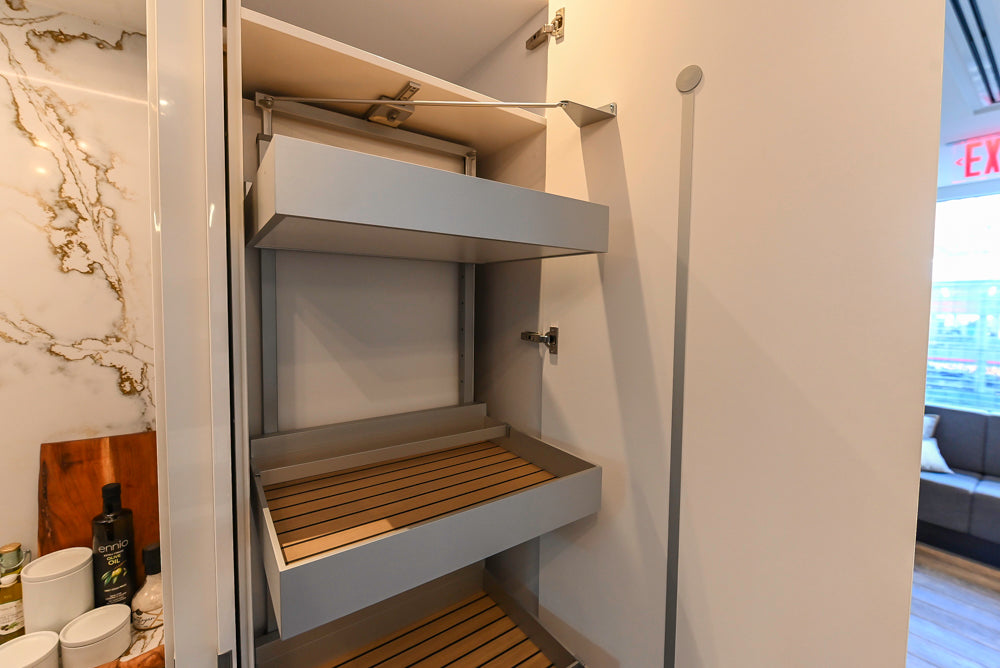 SieMatic S2 Modern Rose Gold Handleless Island with Lotus White Hideaway Pantry