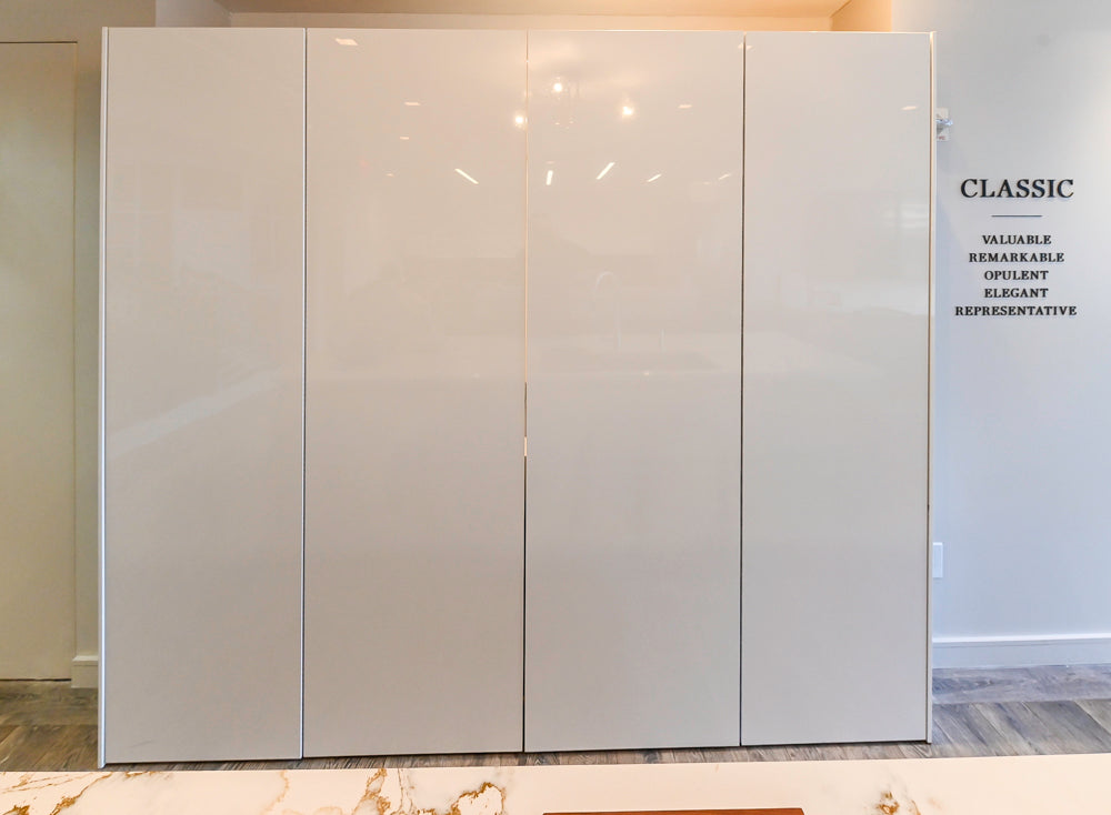 SieMatic S2 Modern Rose Gold Handleless Island with Lotus White Hideaway Pantry