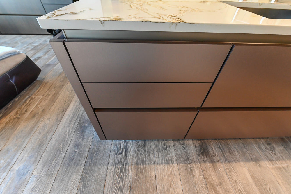SieMatic S2 Modern Rose Gold Handleless Island with Lotus White Hideaway Pantry