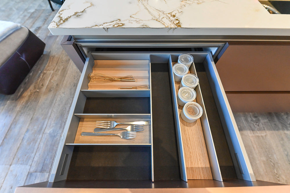SieMatic S2 Modern Rose Gold Handleless Island with Lotus White Hideaway Pantry