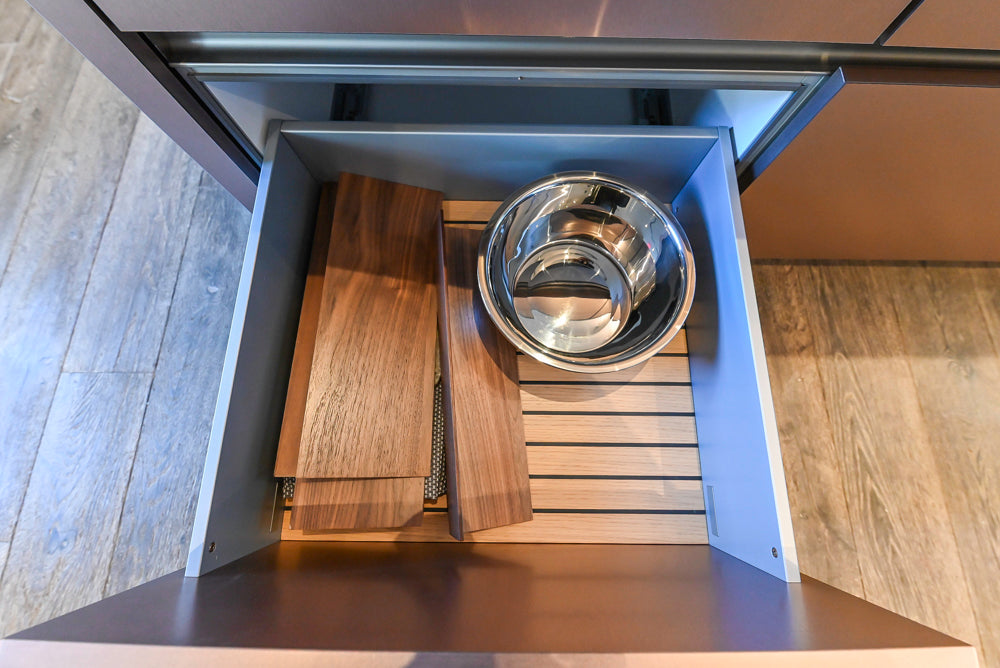 SieMatic S2 Modern Rose Gold Handleless Island with Lotus White Hideaway Pantry