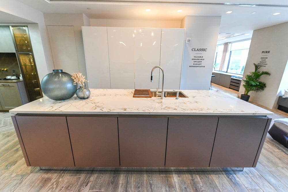 SieMatic S2 Modern Rose Gold Handleless Island with Lotus White Hideaway Pantry