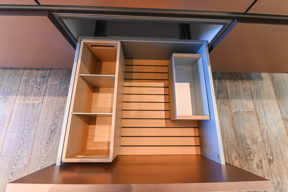 SieMatic S2 Modern Rose Gold Handleless Island with Lotus White Hideaway Pantry