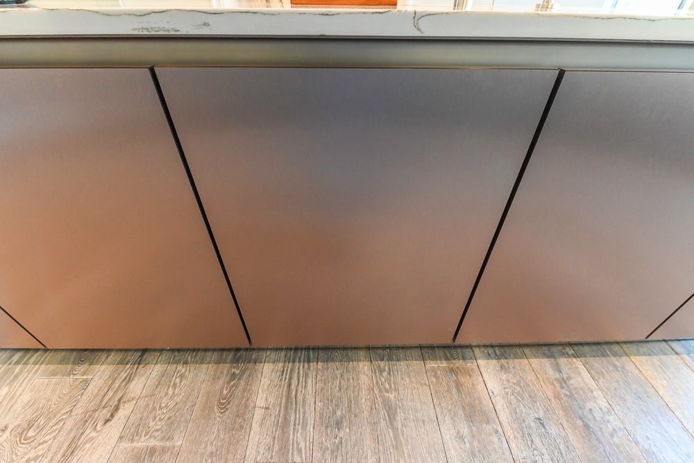 SieMatic S2 Modern Rose Gold Handleless Island with Lotus White Hideaway Pantry