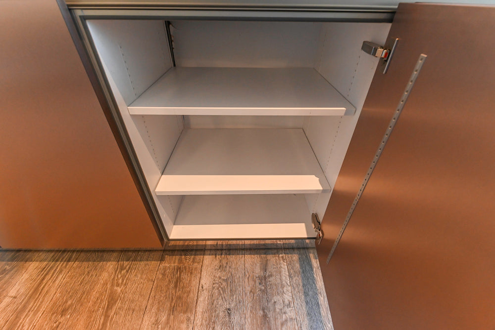 SieMatic S2 Modern Rose Gold Handleless Island with Lotus White Hideaway Pantry
