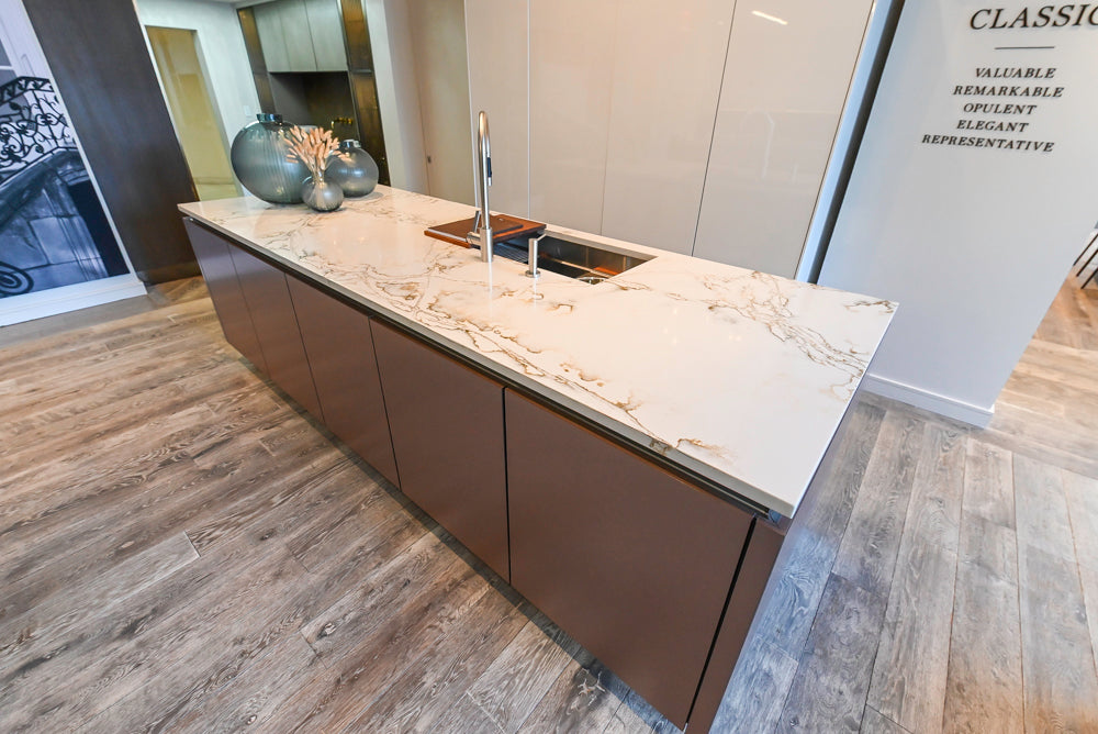 SieMatic S2 Modern Rose Gold Handleless Island with Lotus White Hideaway Pantry