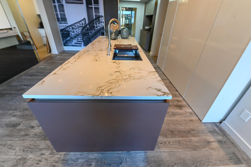 SieMatic S2 Modern Rose Gold Handleless Island with Lotus White Hideaway Pantry
