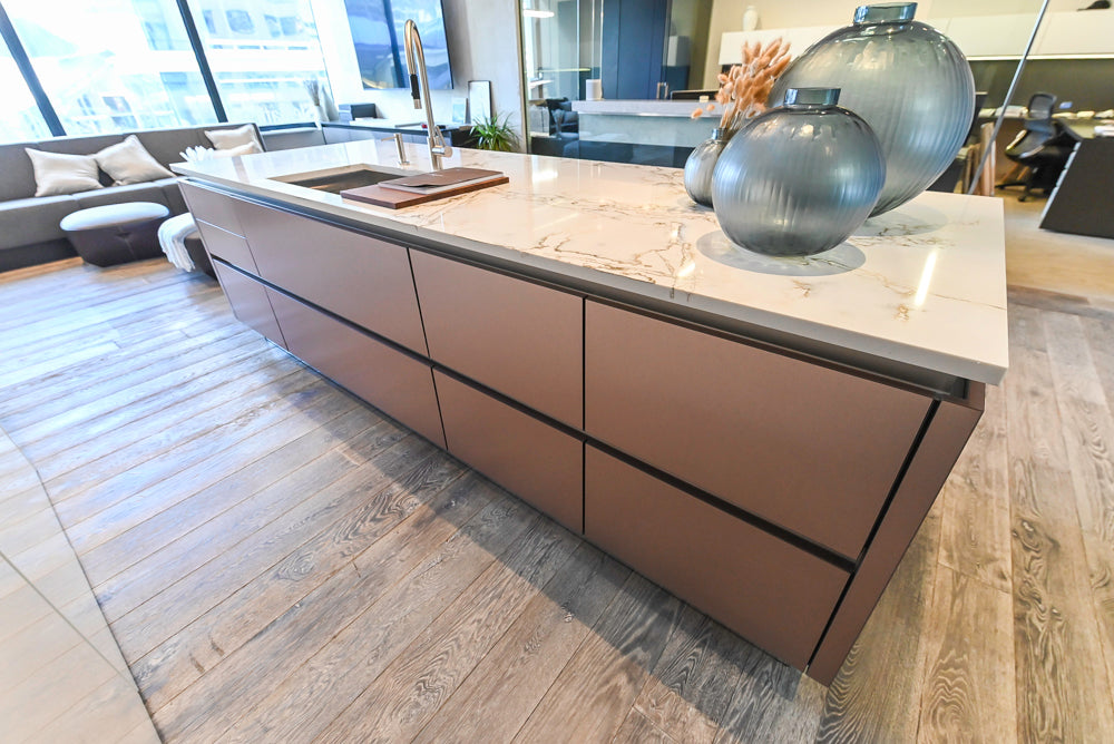 SieMatic S2 Modern Rose Gold Handleless Island with Lotus White Hideaway Pantry