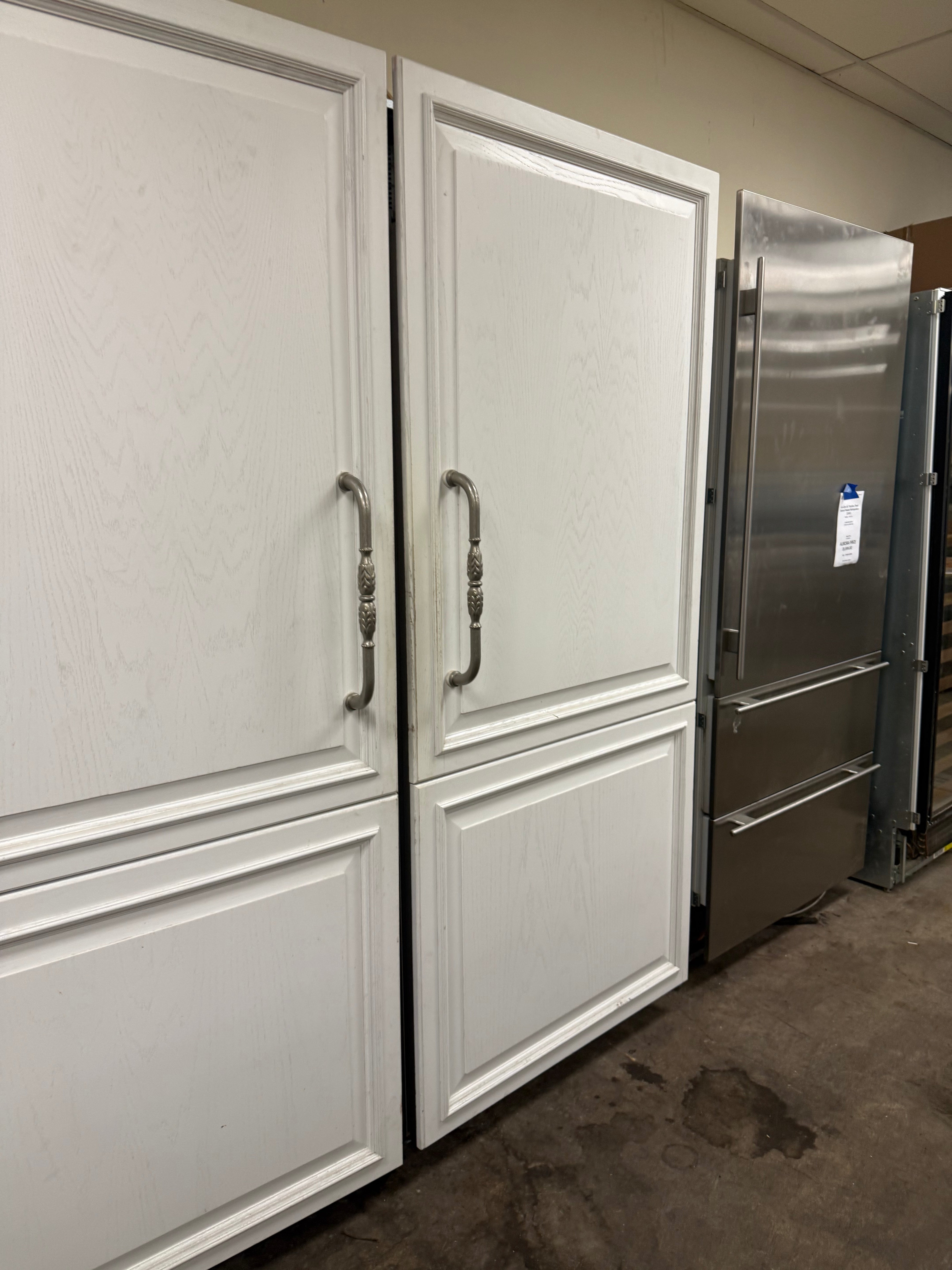 Sub Zero 36 inch fresh food refrigerator highlighting the top air purification cartridge panel