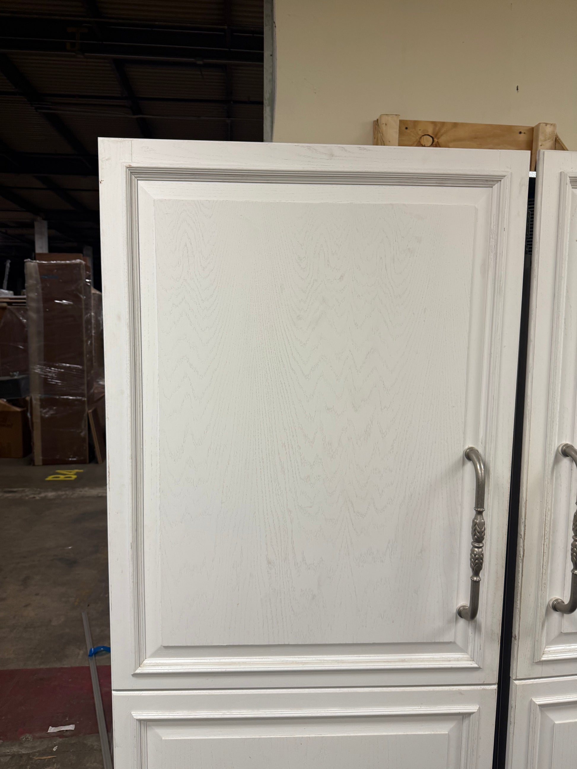 Sub Zero 36 inch freezer highlighting the adjustable glass shelves and water filter system panel