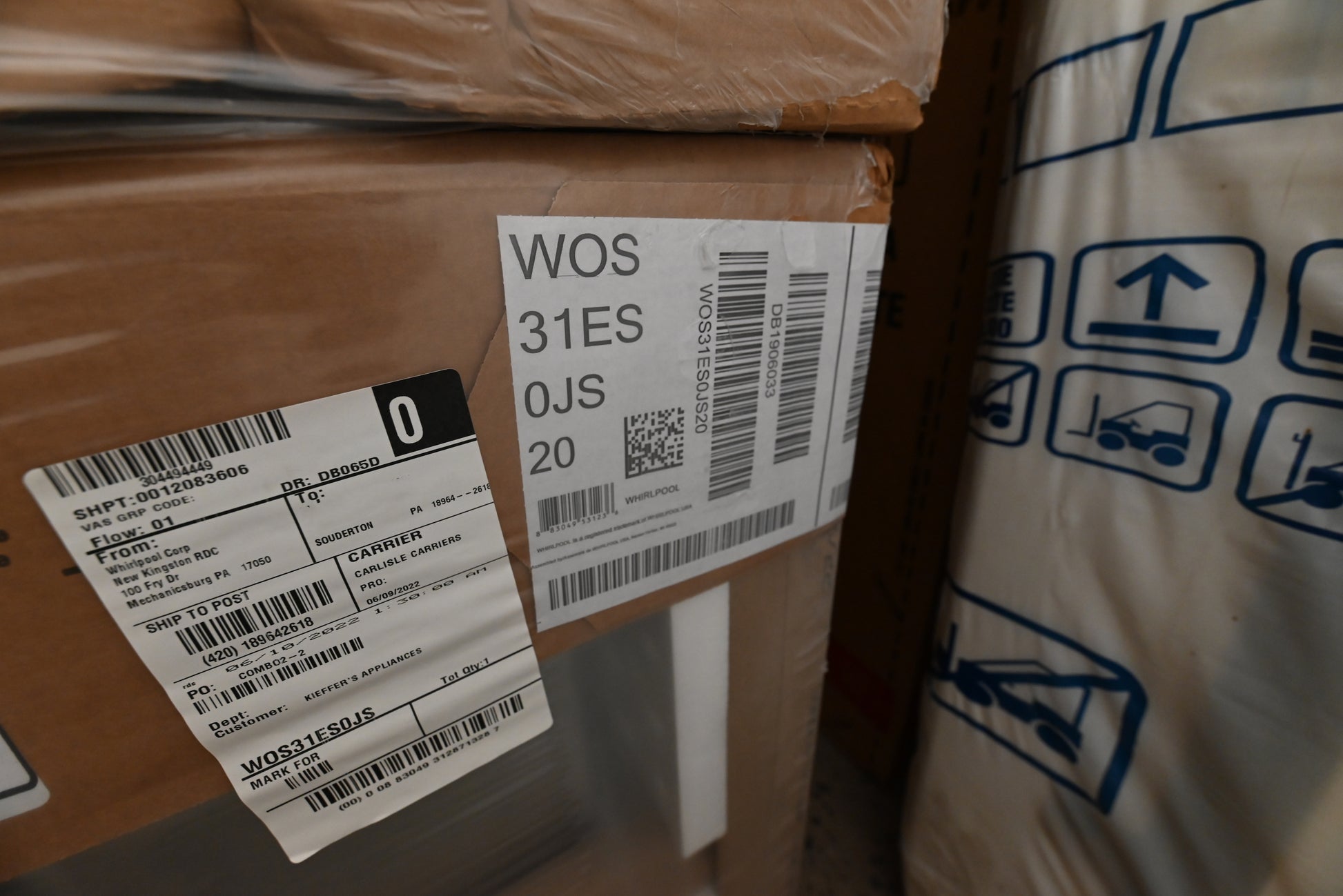 Modern built-in Whirlpool WOS31ES0JS oven installed flush with cabinetry