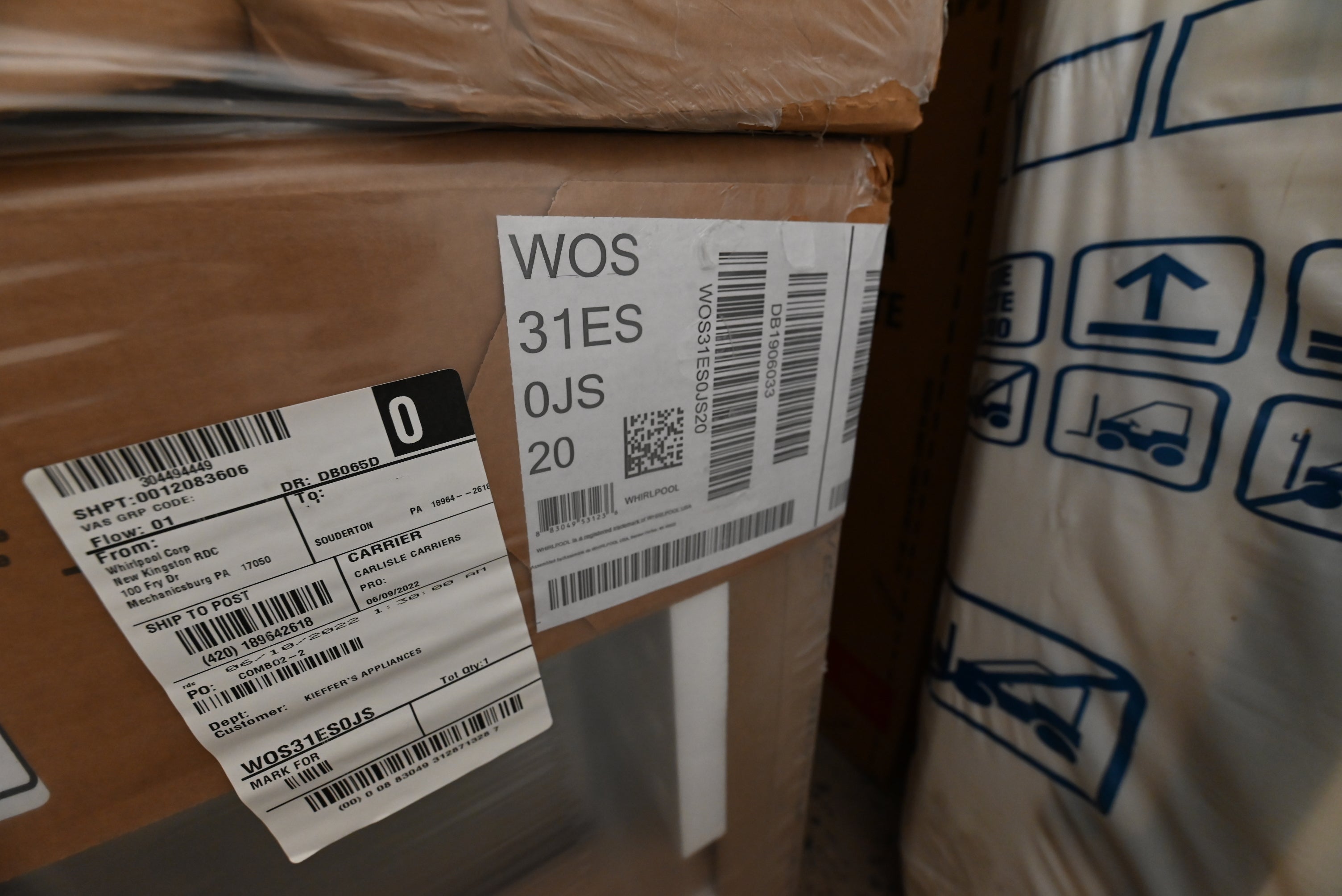 Modern built-in Whirlpool WOS31ES0JS oven installed flush with cabinetry