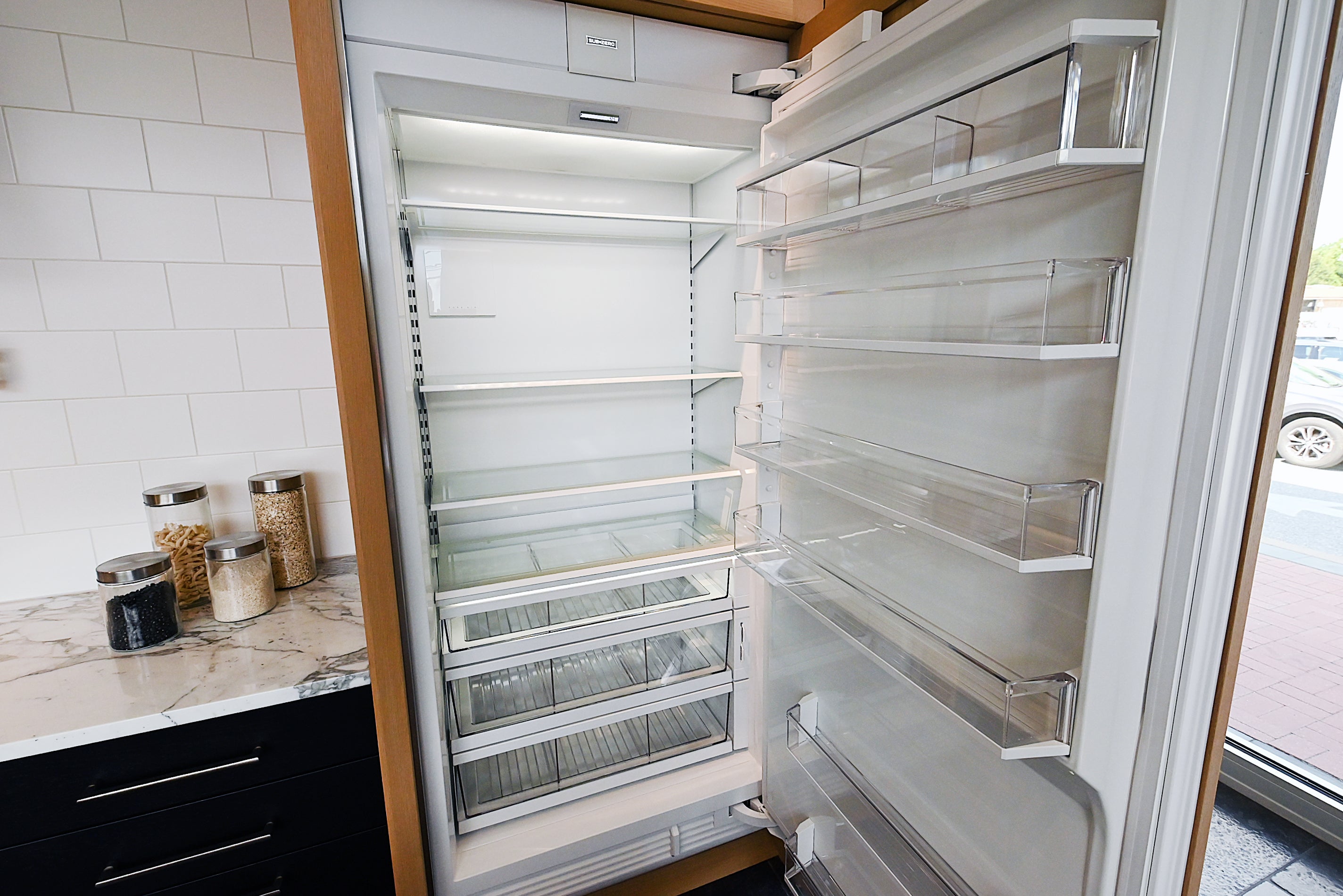 Quality Custom Marble & Onyx Flair Transitional Showroom Display Kitchen