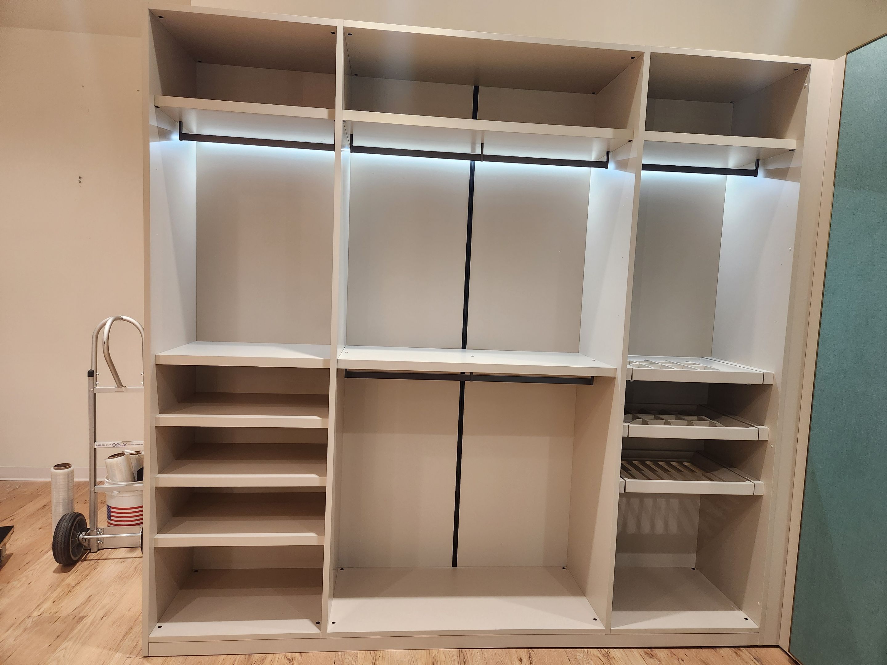 Hans Krug modern architectural built-in closet system with integrated LED lighting
