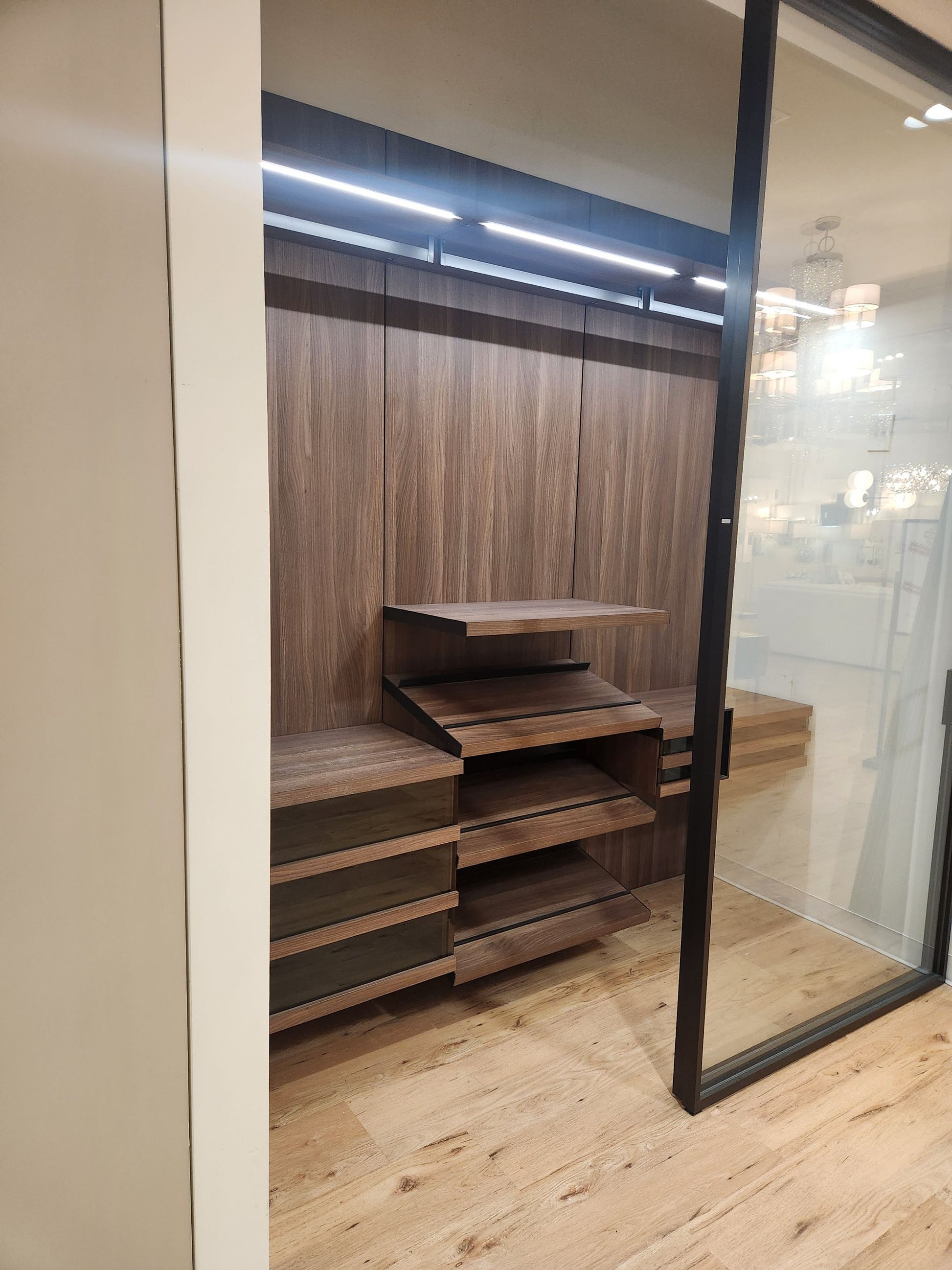 Hans Krug modern built-in brown laminate closet system and wardrobe