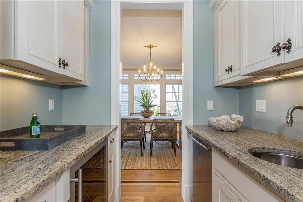 Omega Traditional Light Cream Butler's Pantry with Granite Countertops and Wine Cooler