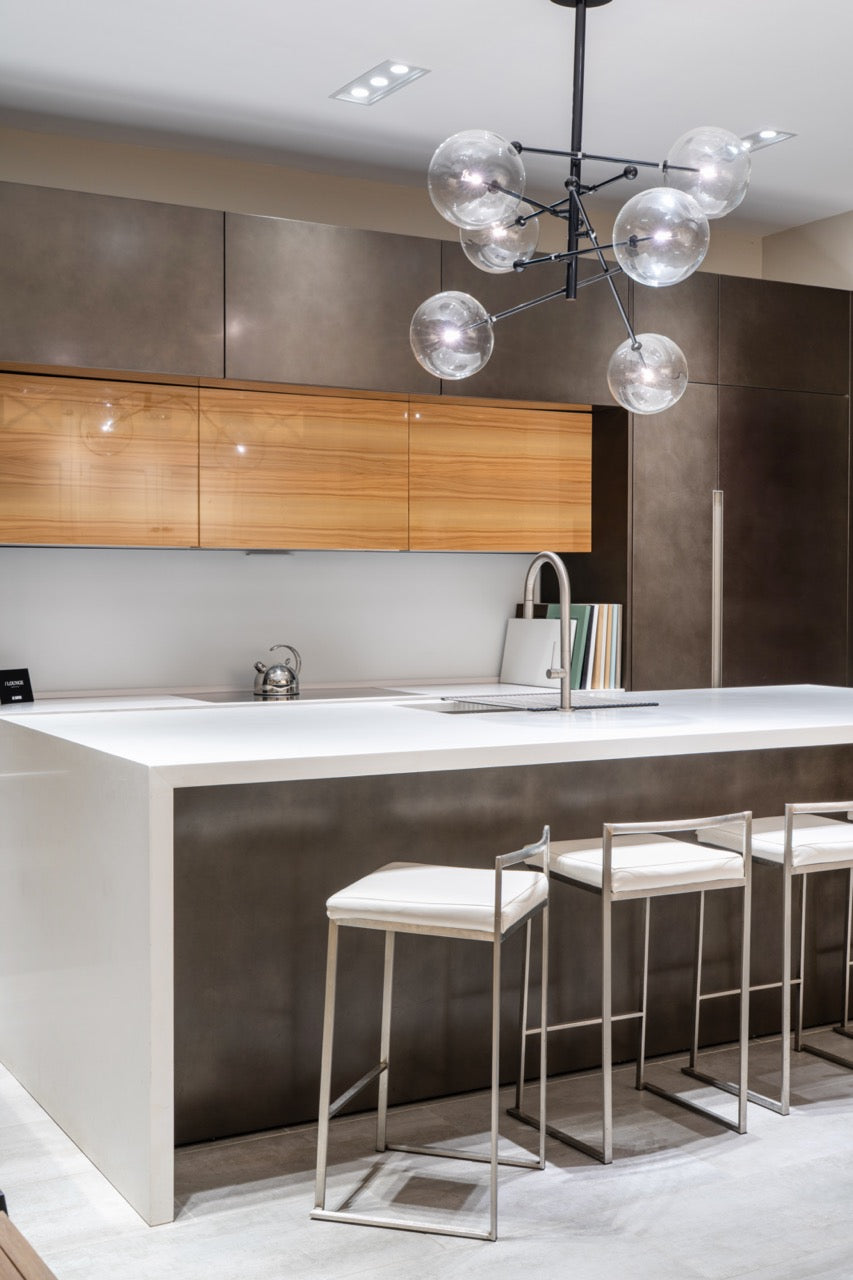 Composit Modern Brown Kitchen with Waterfall Island, Stone Countertops and Wolf & Sub-Zero Appliances
