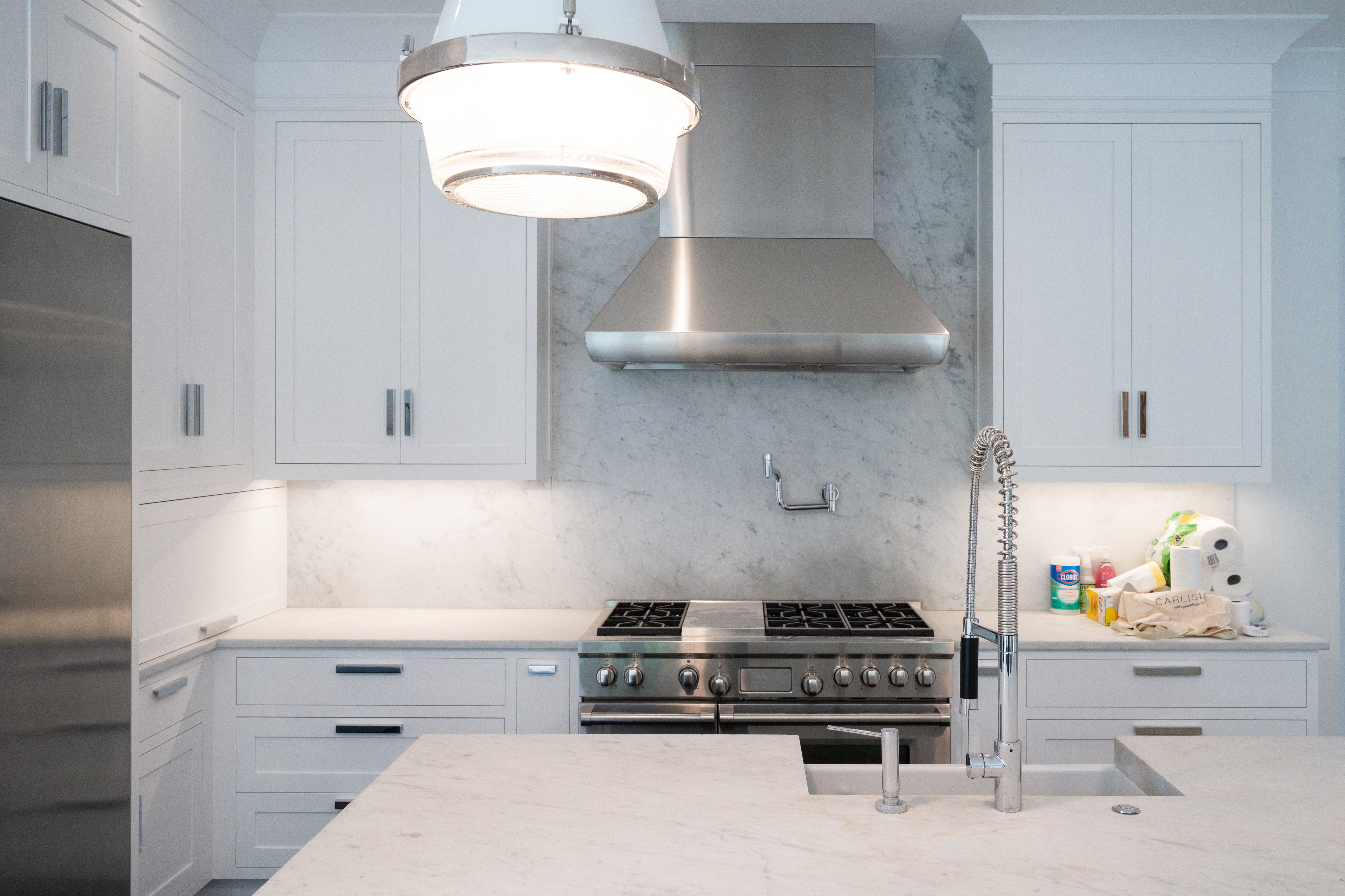 “The Pembroke” Transitional White Kitchen with Island, Wolf & Sub-Zero Appliances