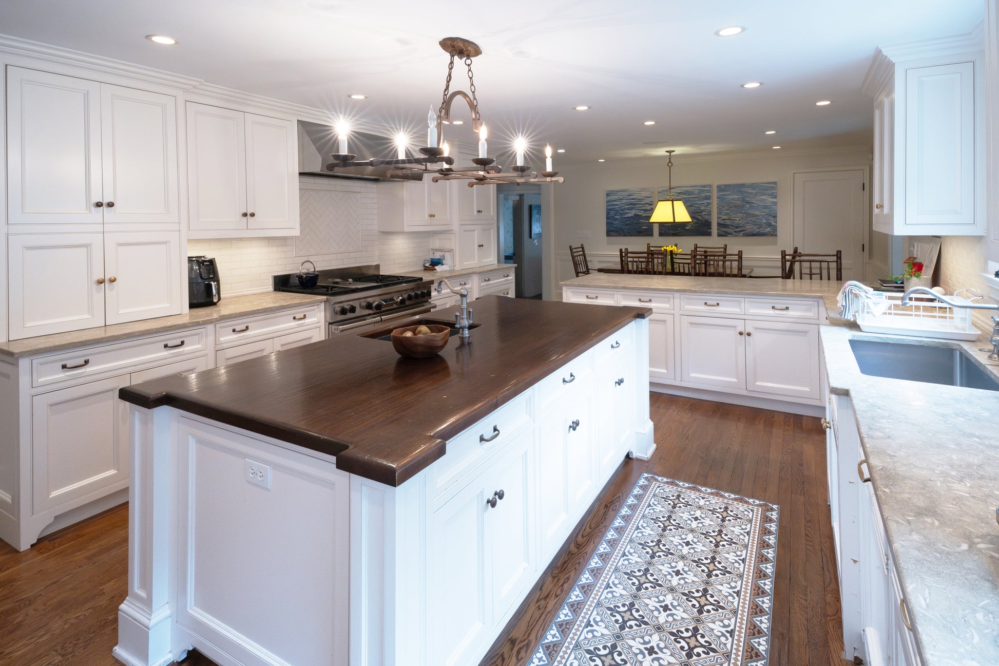 "The Montclair" Transitional White Kitchen with Island & Wolf 48" Range