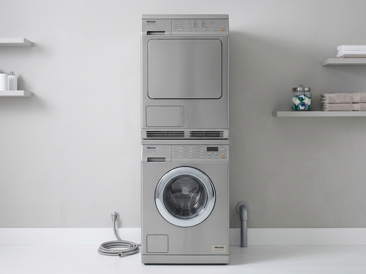 Miele 24 inch stainless steel front load washer and dryer set with stacking kit