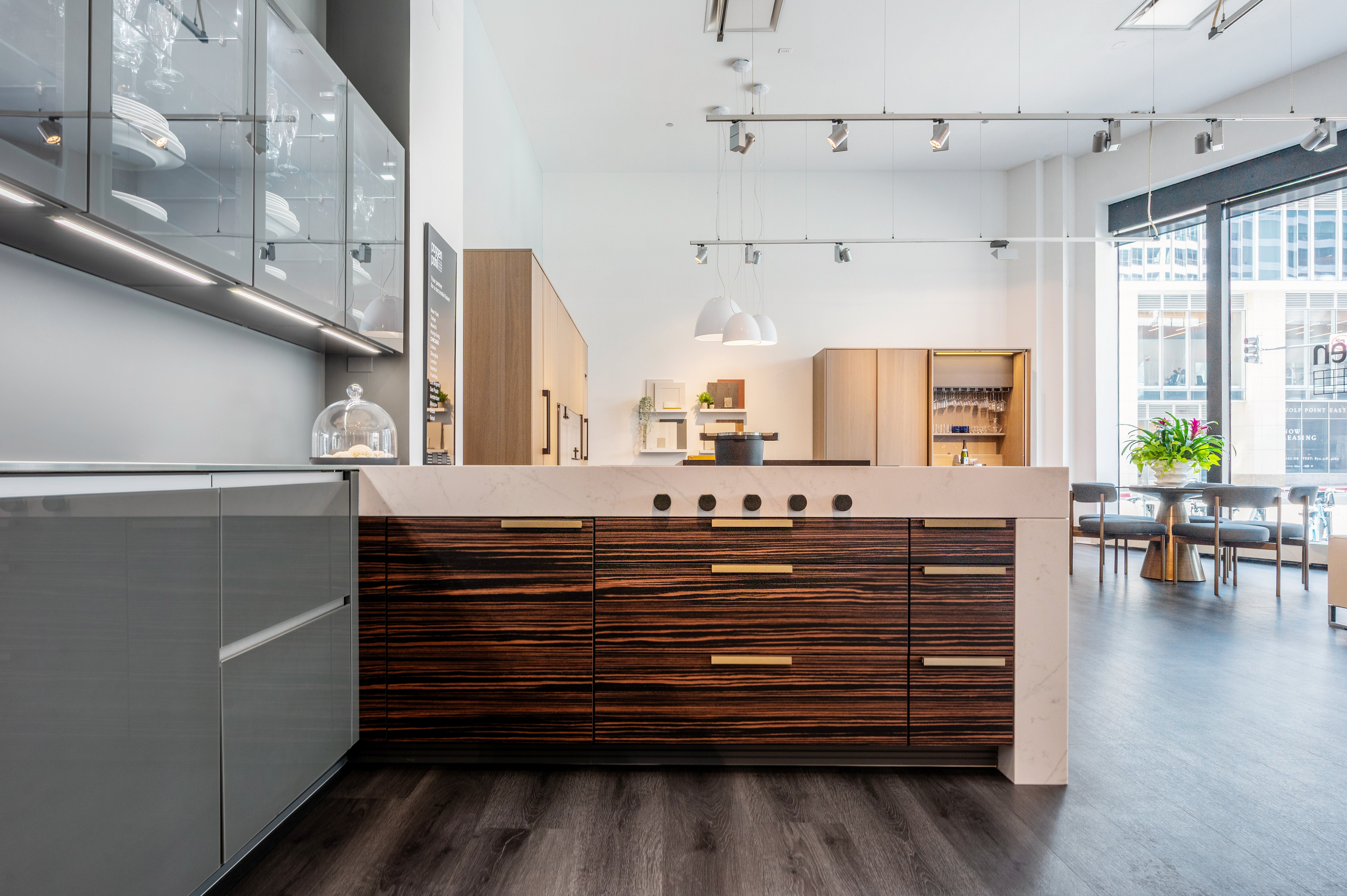 Poggenpohl Standard Modern Multi-Tone Kitchen with Glass Upper Cabinets and Sub-Zero & Wolf Appliances