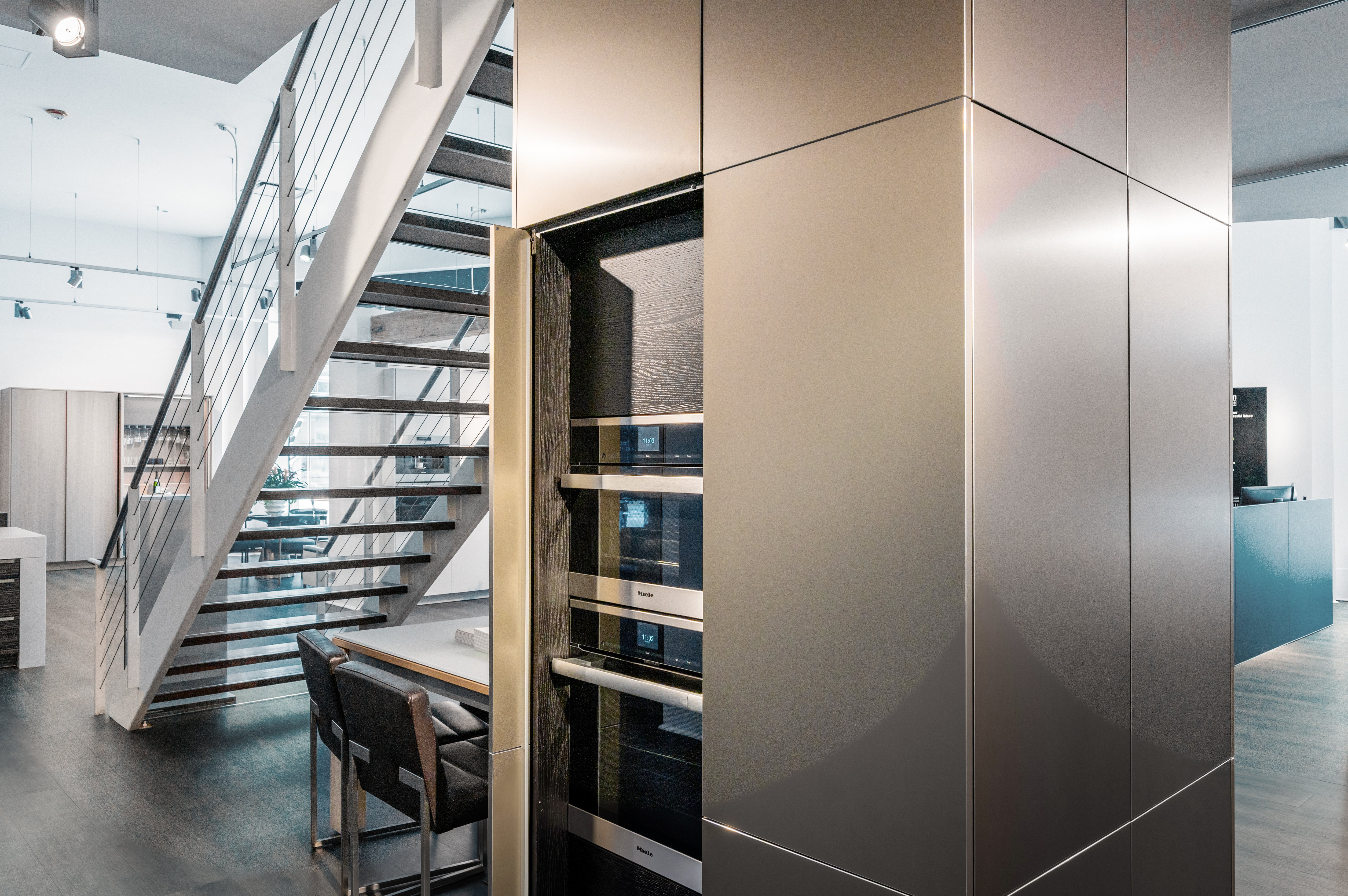 Poggenpohl Segmento Modern Black Kitchen with Miele Appliances