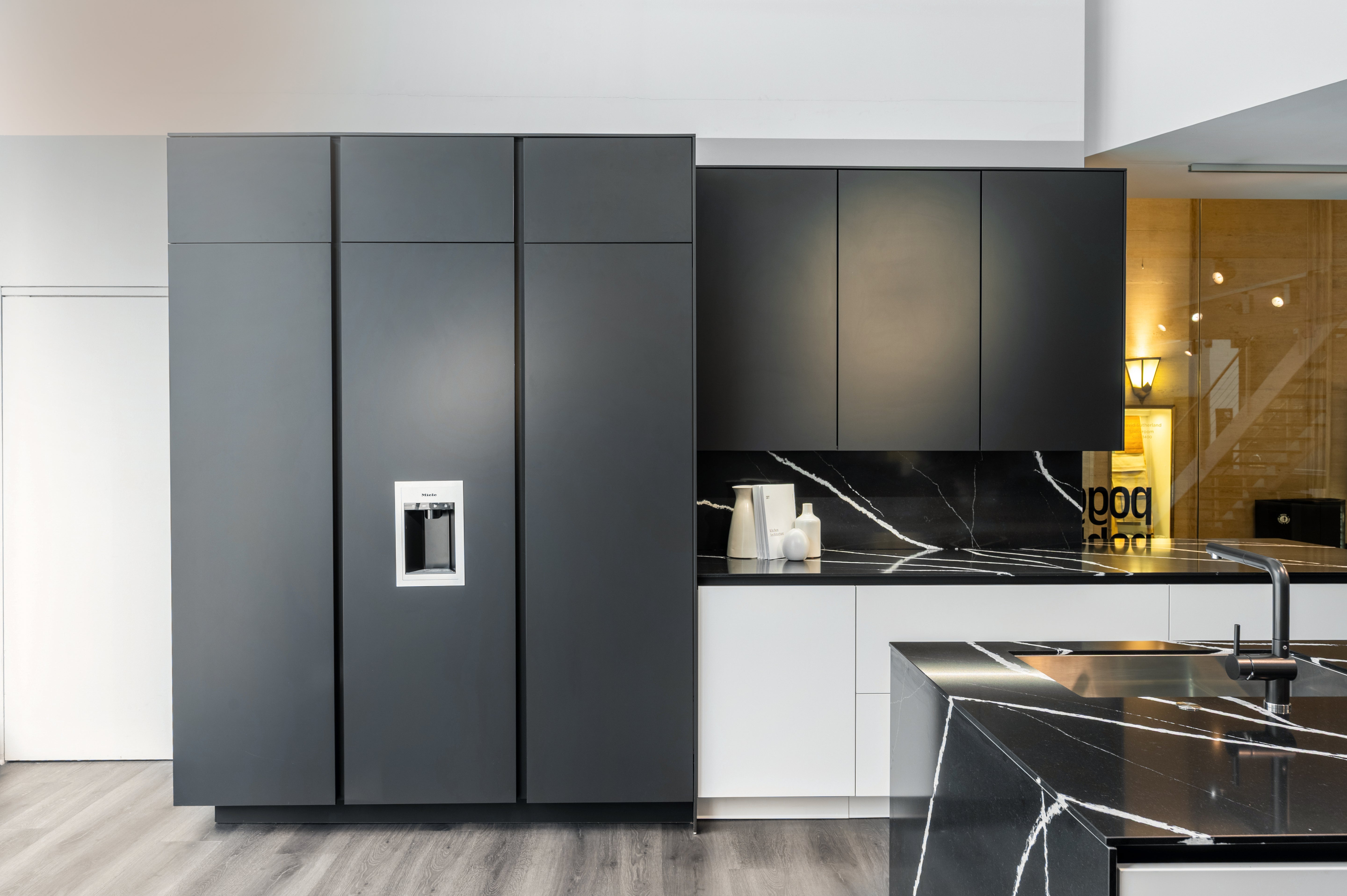 Poggenpohl Segmento Y Modern Black and White Kitchen with Wolf & Miele Appliances
