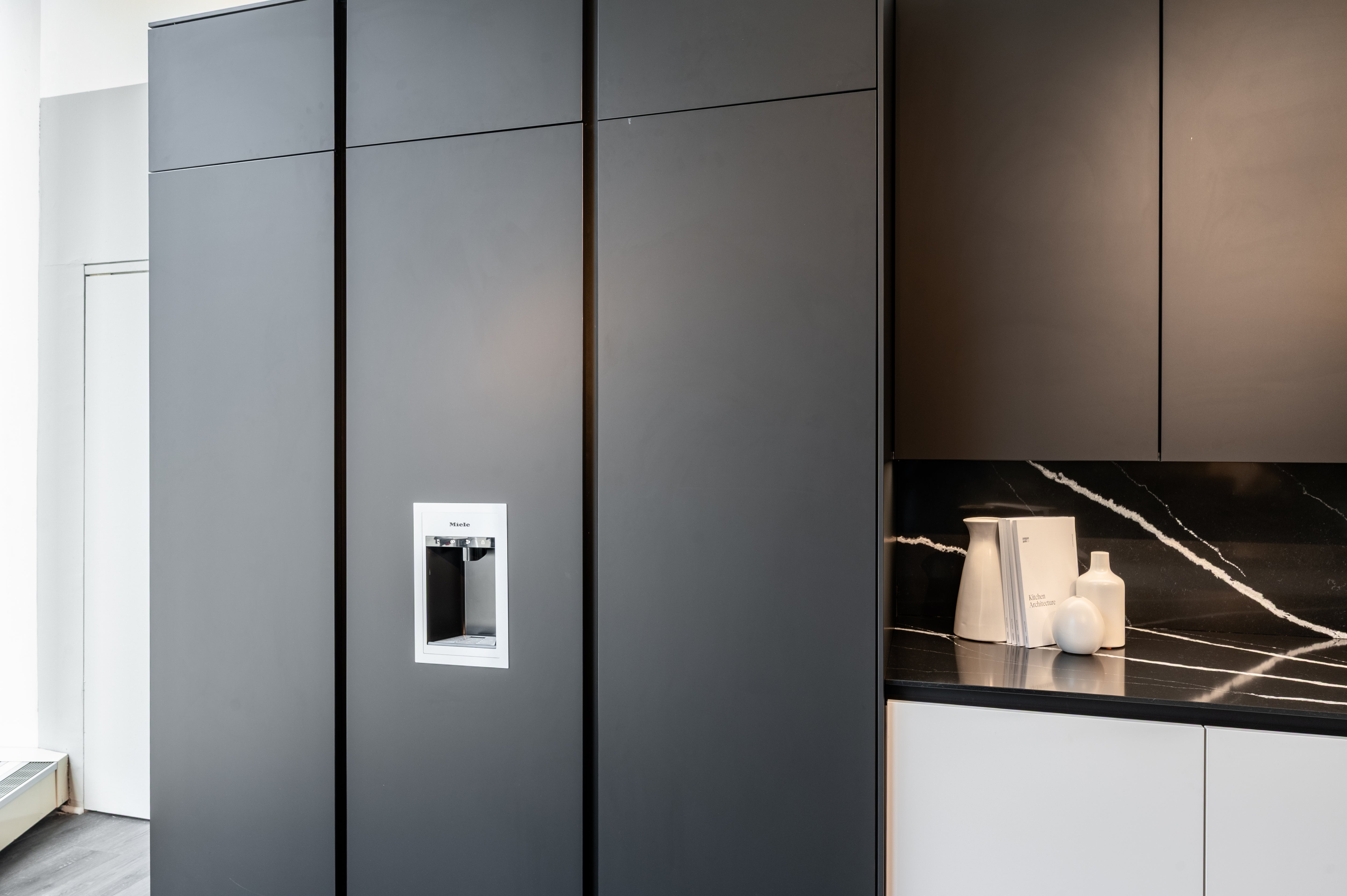 Poggenpohl Segmento Y Modern Black and White Kitchen with Wolf & Miele Appliances
