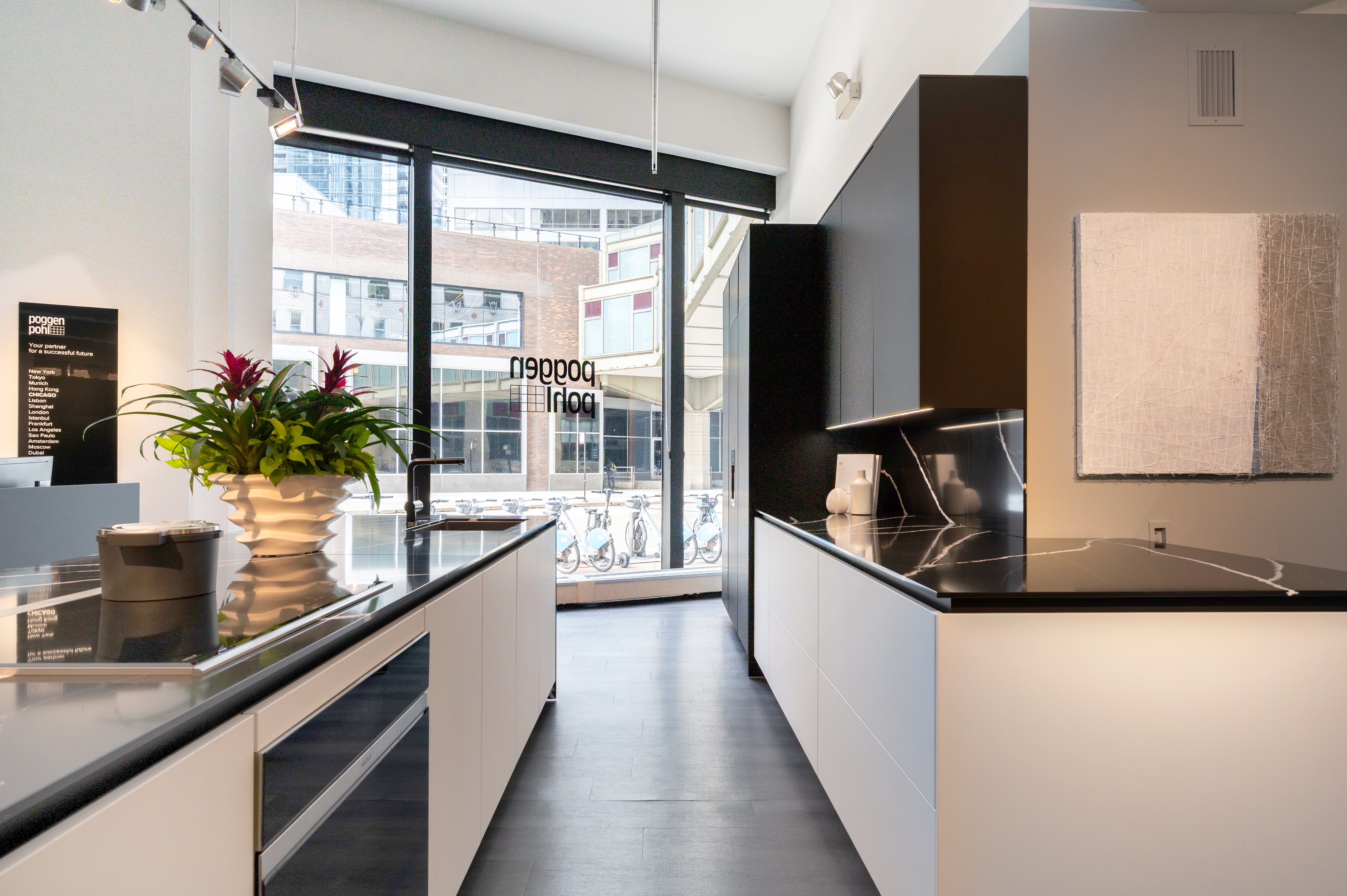 Poggenpohl Segmento Y Modern Black and White Kitchen with Wolf & Miele Appliances