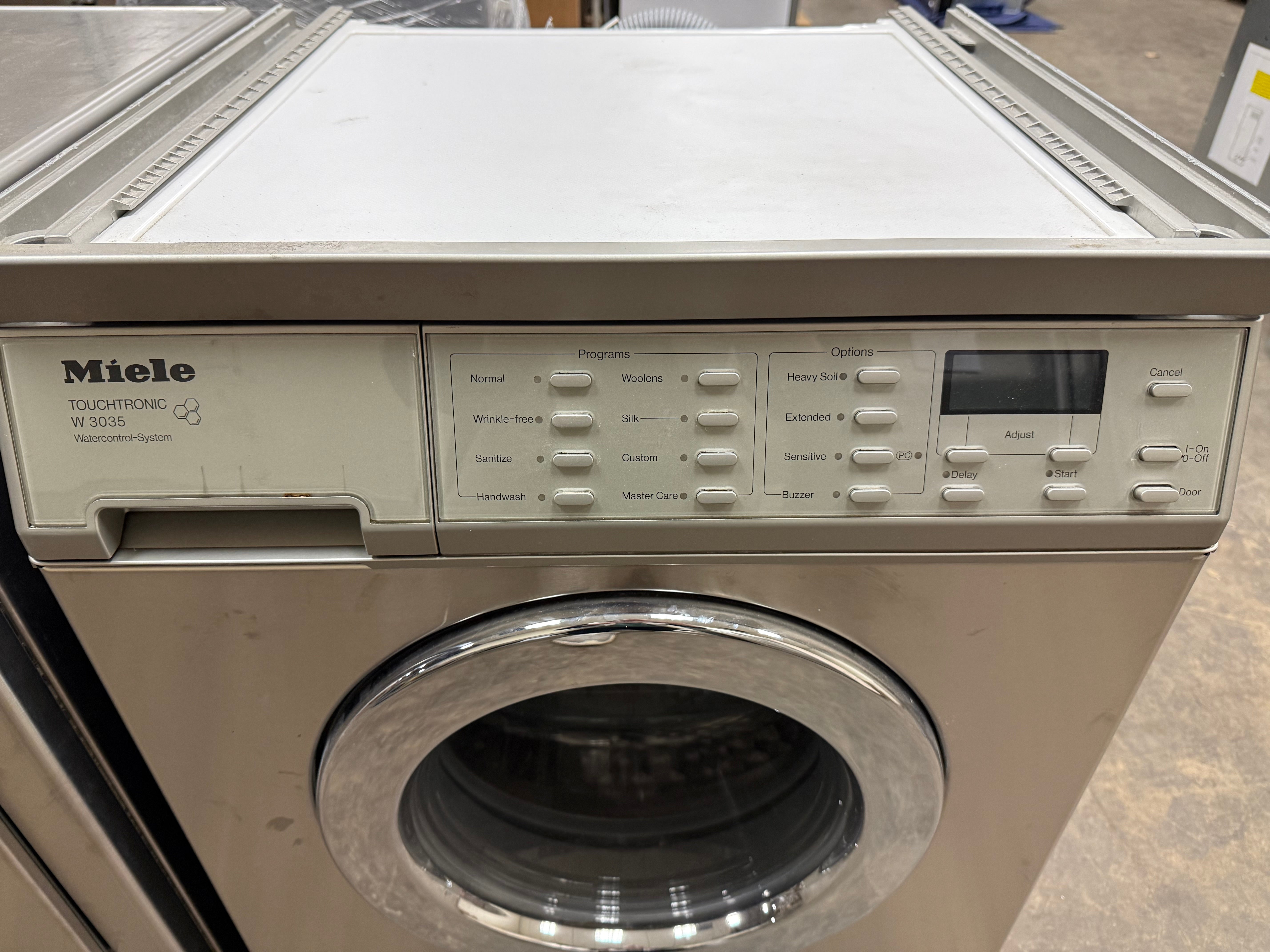 Miele 24" Stainless Steel Professional Stackable Laundry Suite