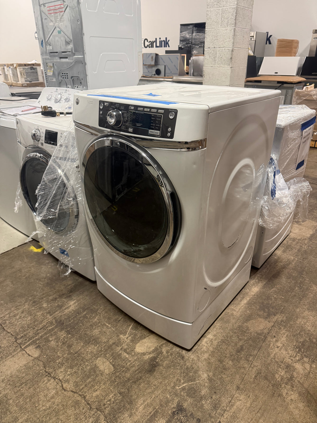 GE steam electric dryer in white finish