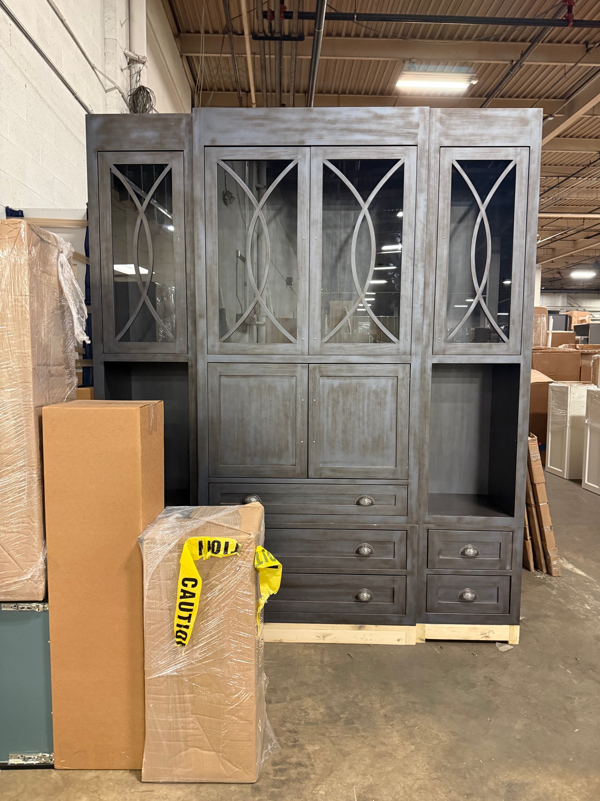 Large 100 inch tall wood hutch in navy blue with traditional paneled cabinetry