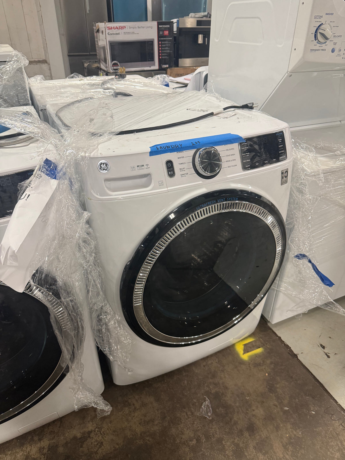 GE GFW550SSNWW 28" White Front Load Washer