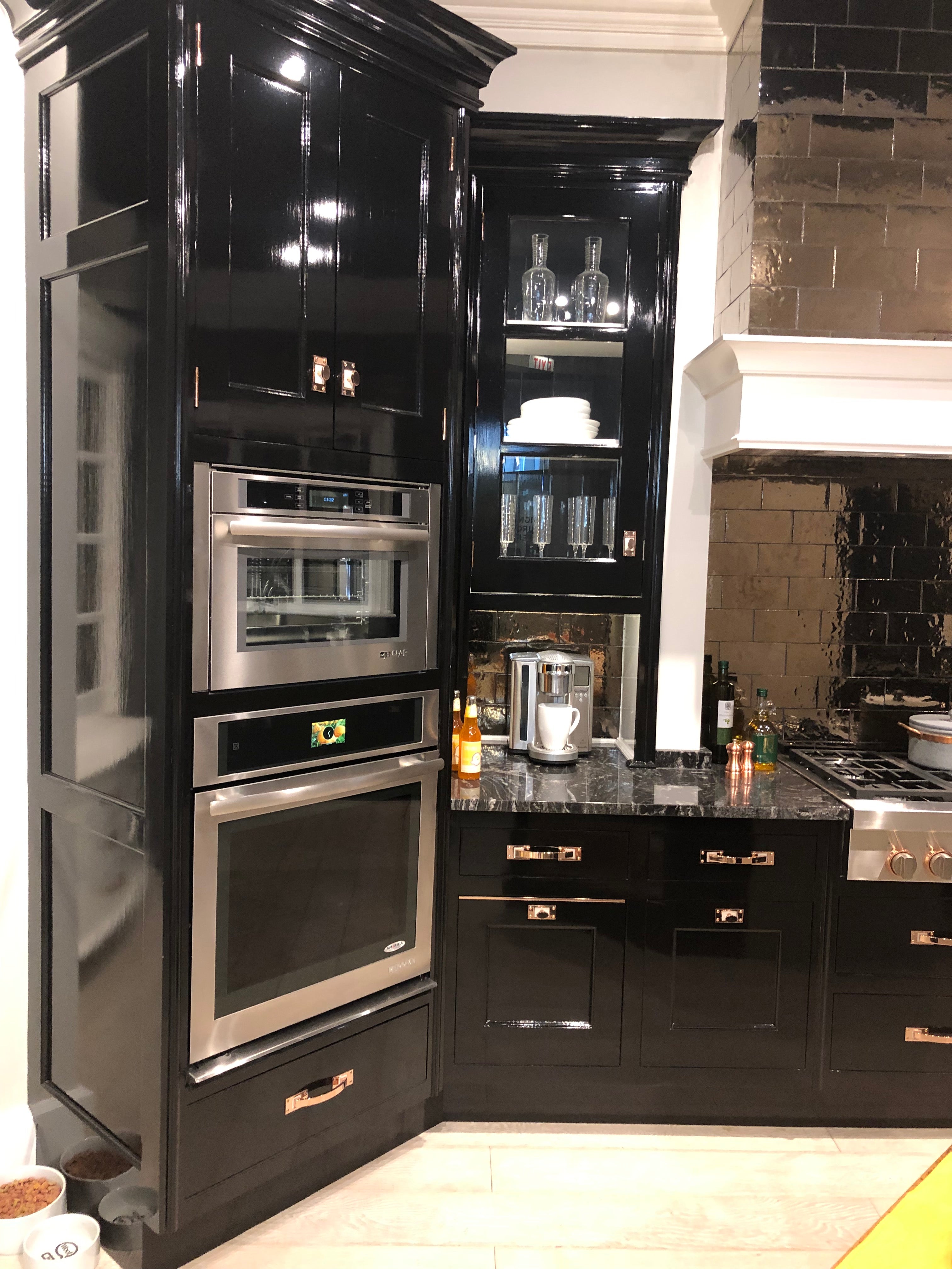Christopher Peacock Traditional Black Kitchen with Stone Countertops & JennAir Appliances