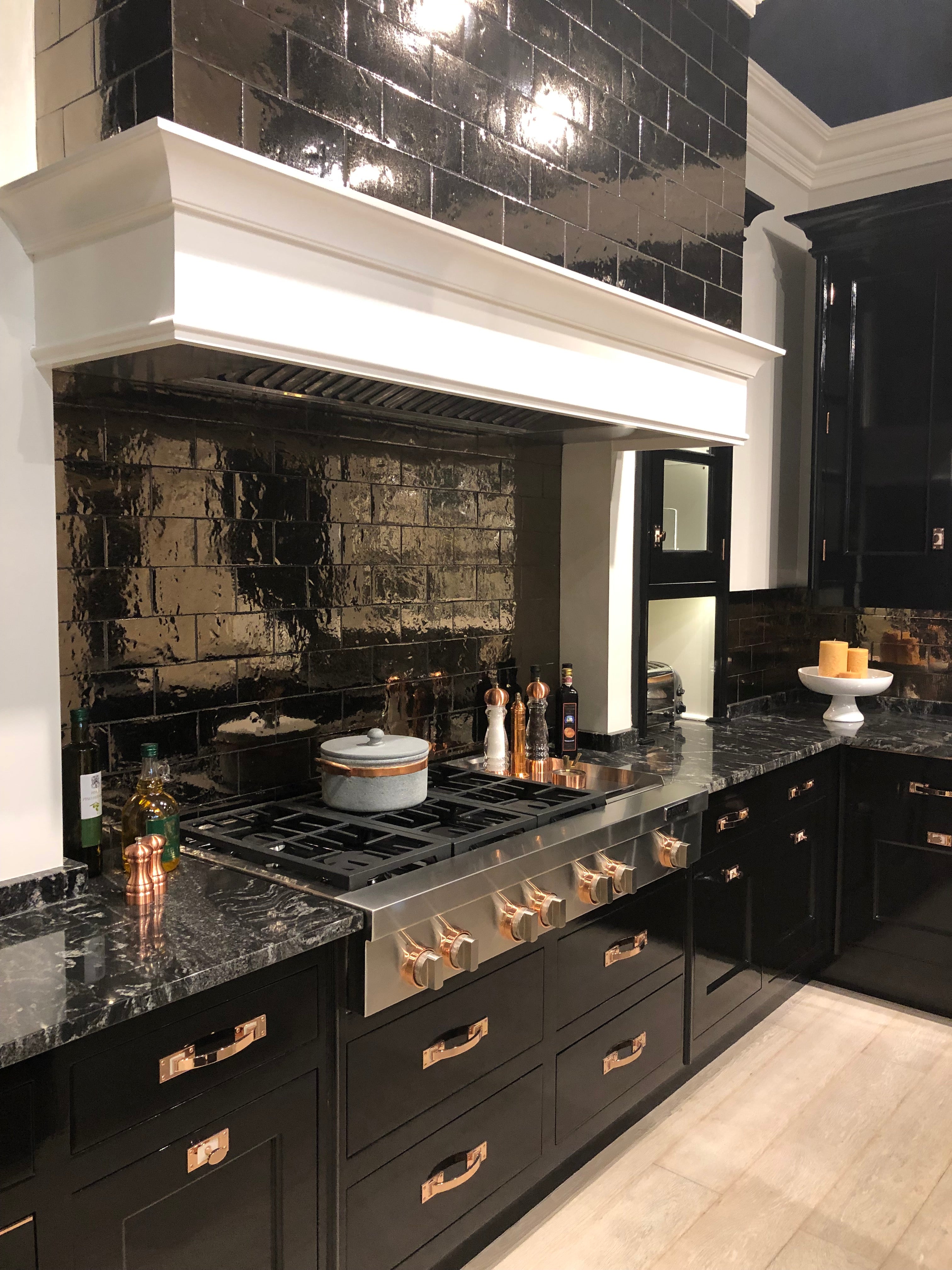 Christopher Peacock Traditional Black Kitchen with Stone Countertops & JennAir Appliances