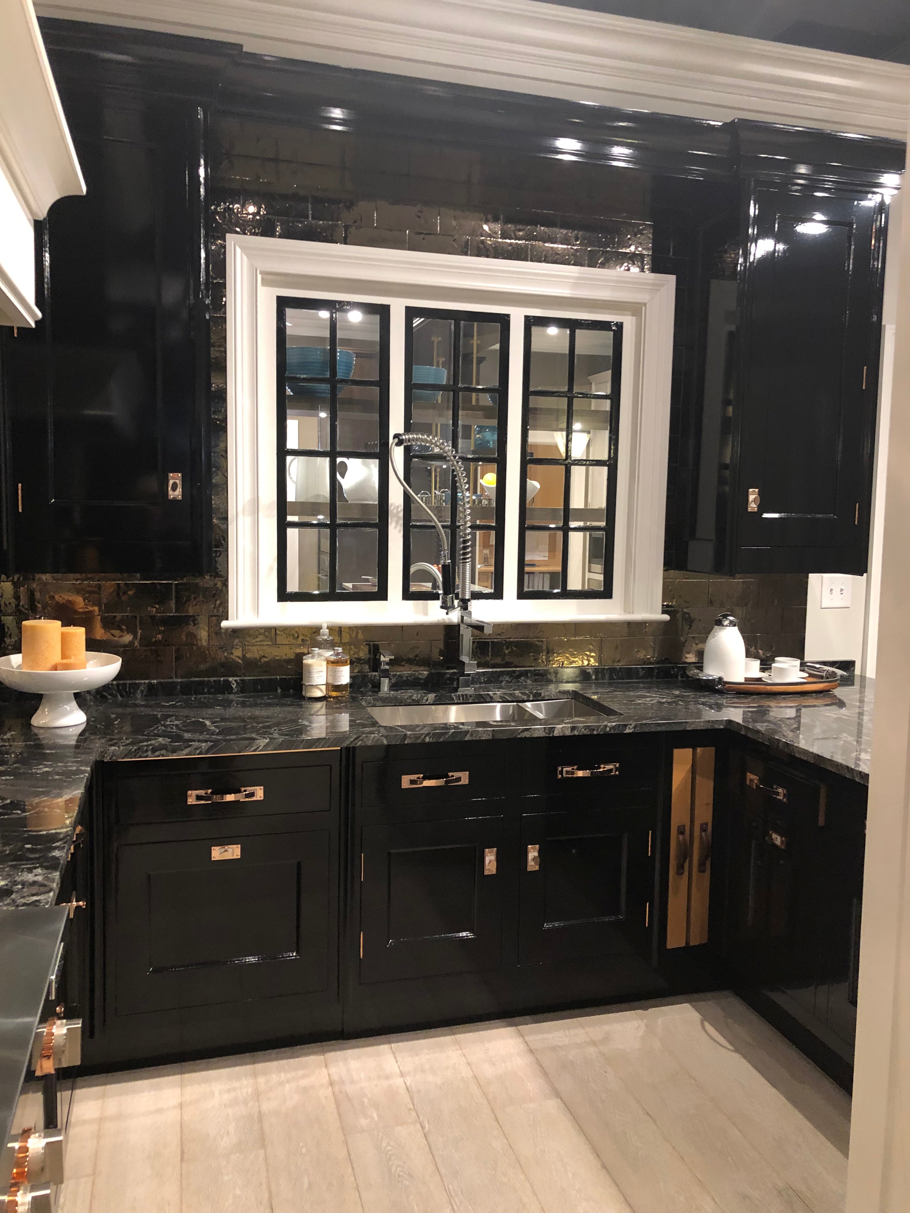 Christopher Peacock Traditional Black Kitchen with Stone Countertops & JennAir Appliances