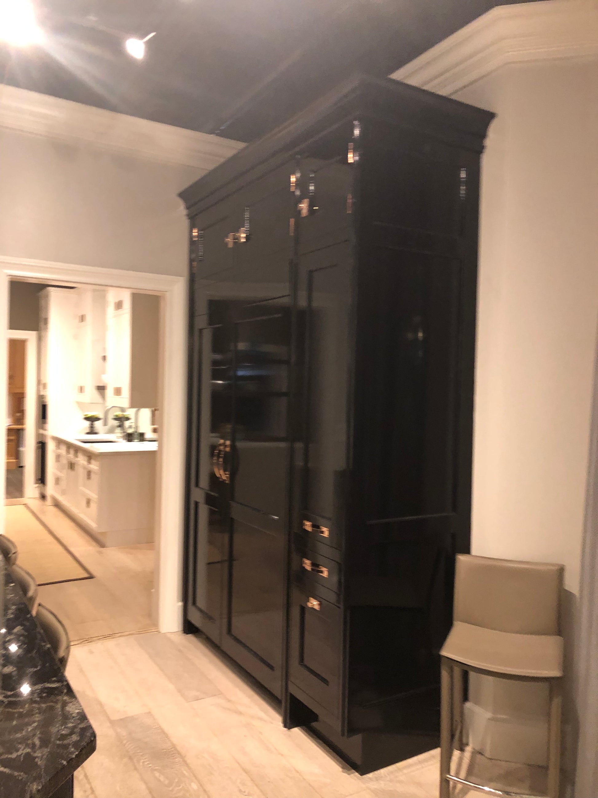 Christopher Peacock Traditional Black Kitchen with Stone Countertops & JennAir Appliances