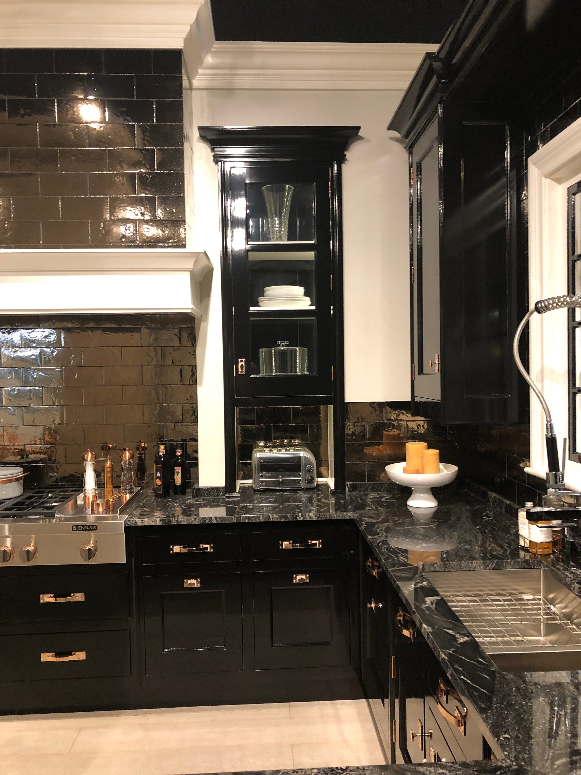 Christopher Peacock Traditional Black Kitchen with Stone Countertops & JennAir Appliances