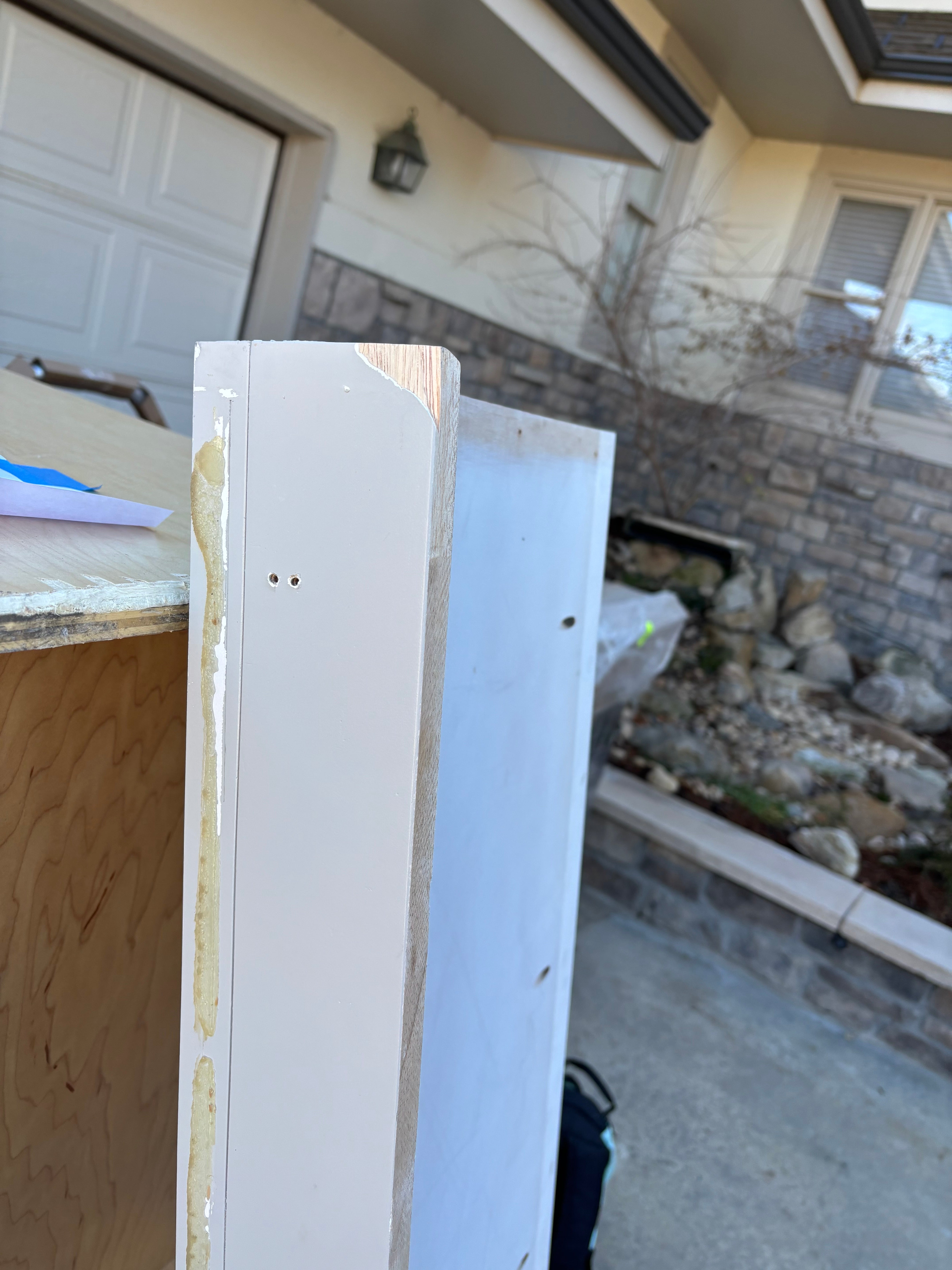 Custom Modern Light Grey Pantry with White Stone Countertops and Stainless Steel Sink