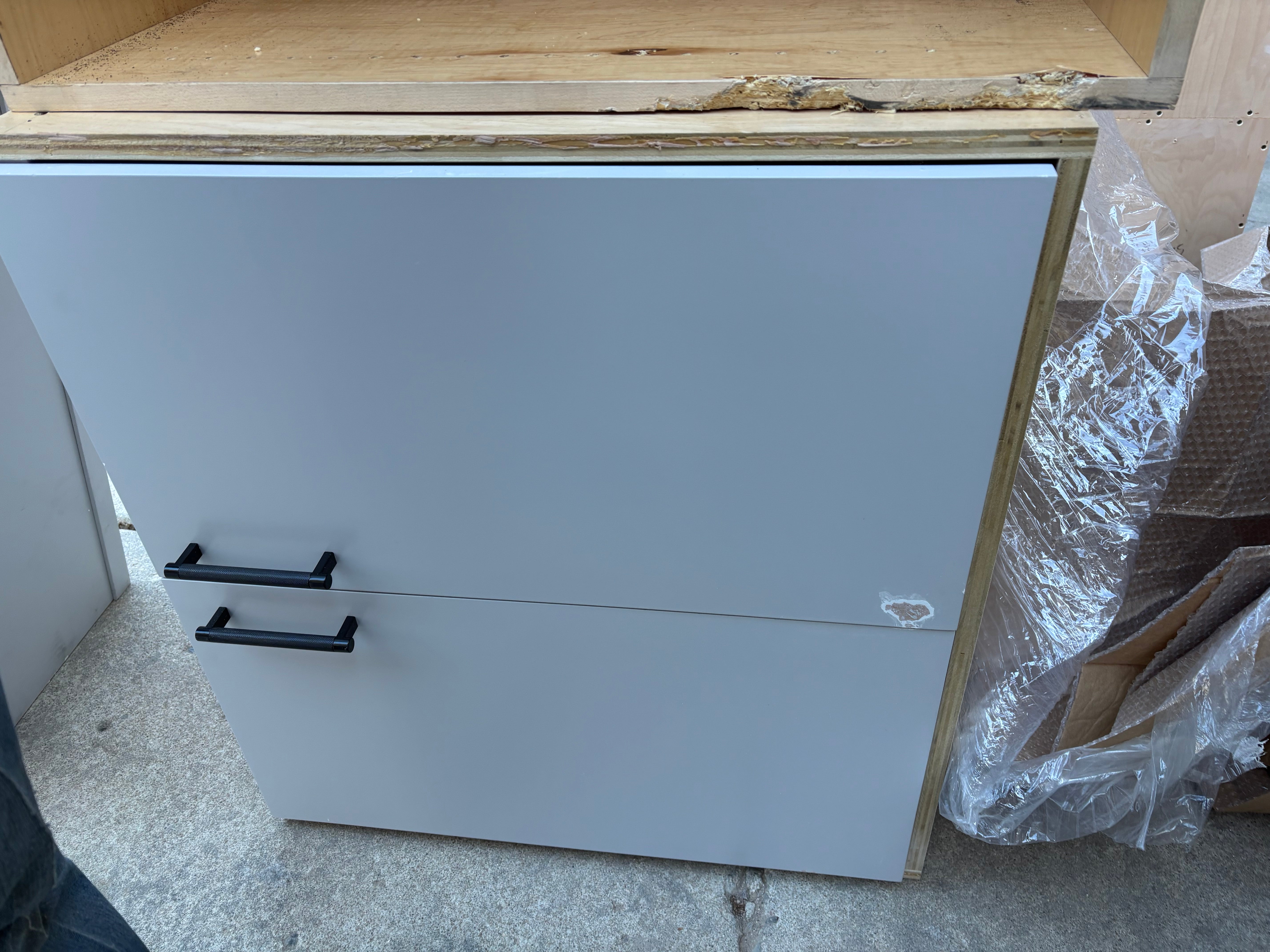 Custom Modern Light Grey Pantry with White Stone Countertops and Stainless Steel Sink