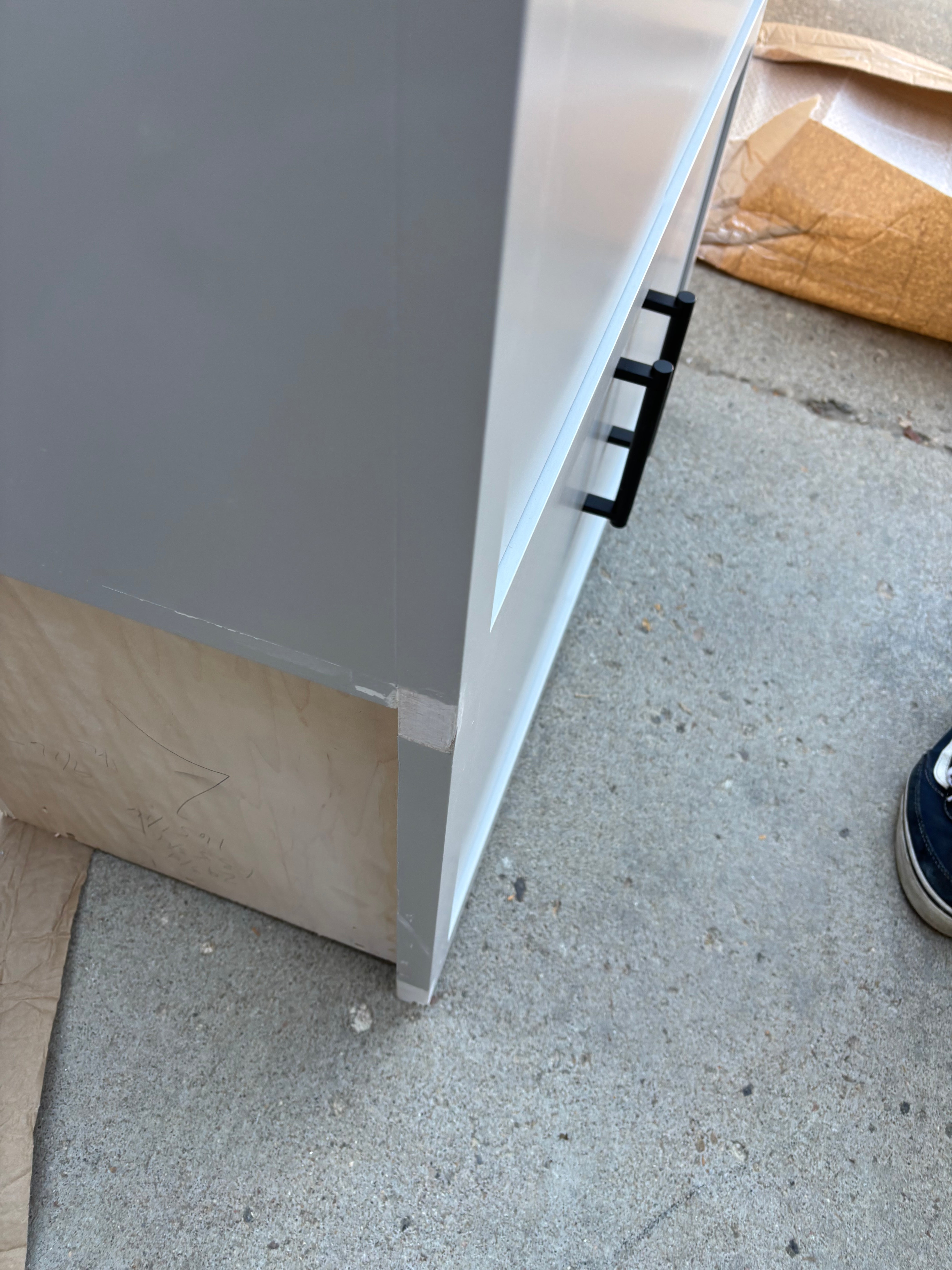 Custom Modern Light Grey Pantry with White Stone Countertops and Stainless Steel Sink