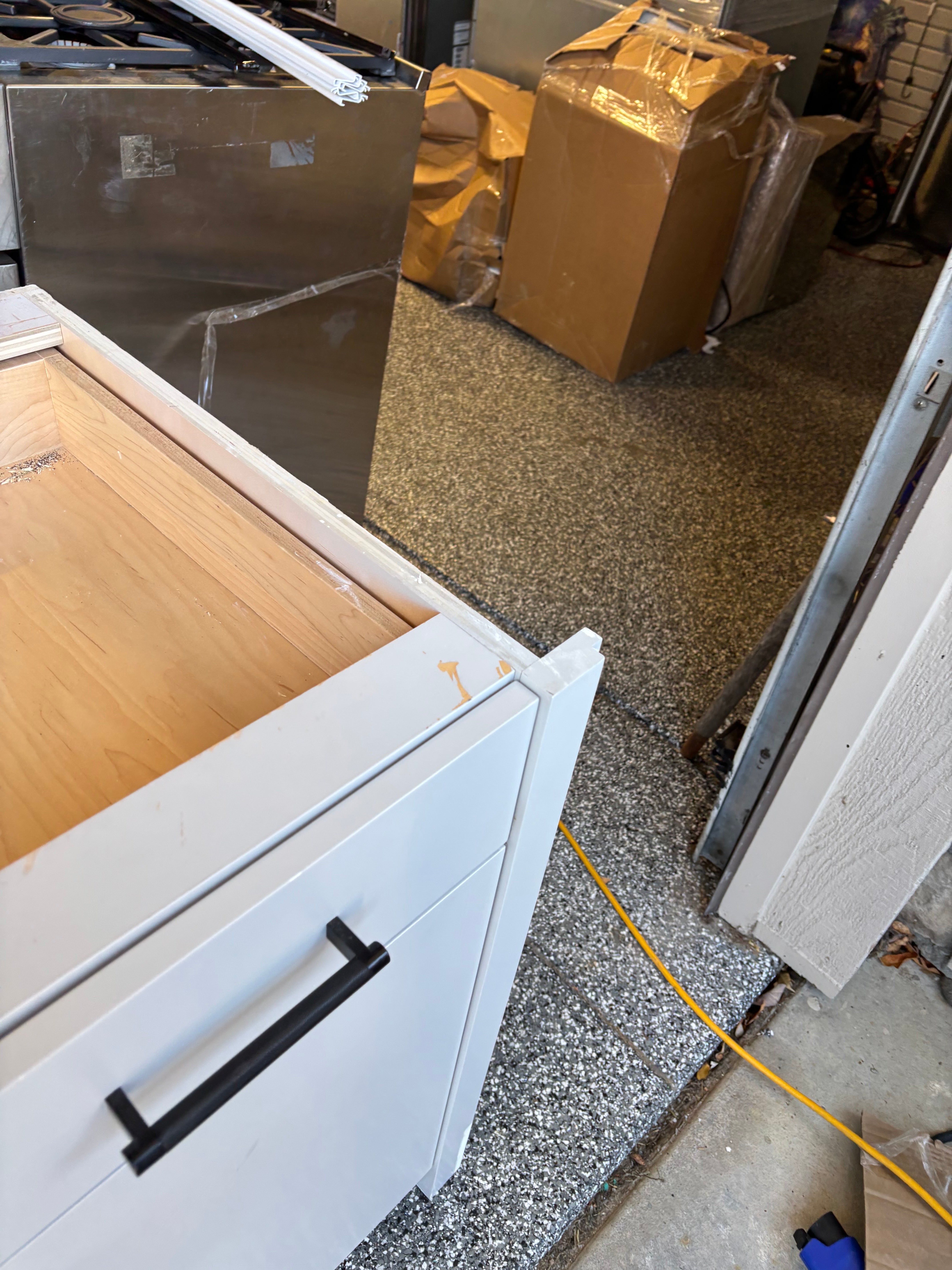 Custom Modern Light Grey Pantry with White Stone Countertops and Stainless Steel Sink