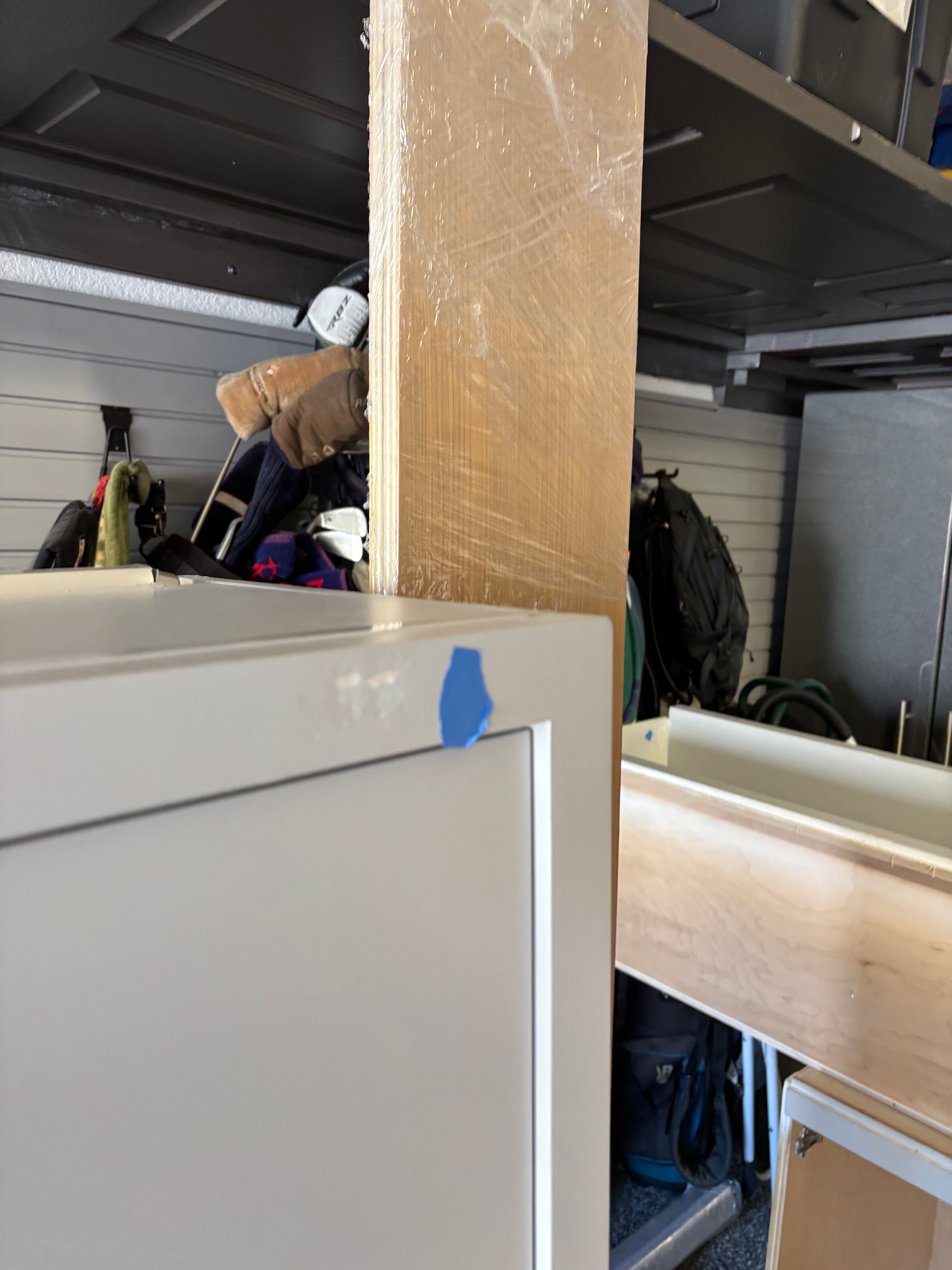 Custom Modern Light Grey Pantry with White Stone Countertops and Stainless Steel Sink